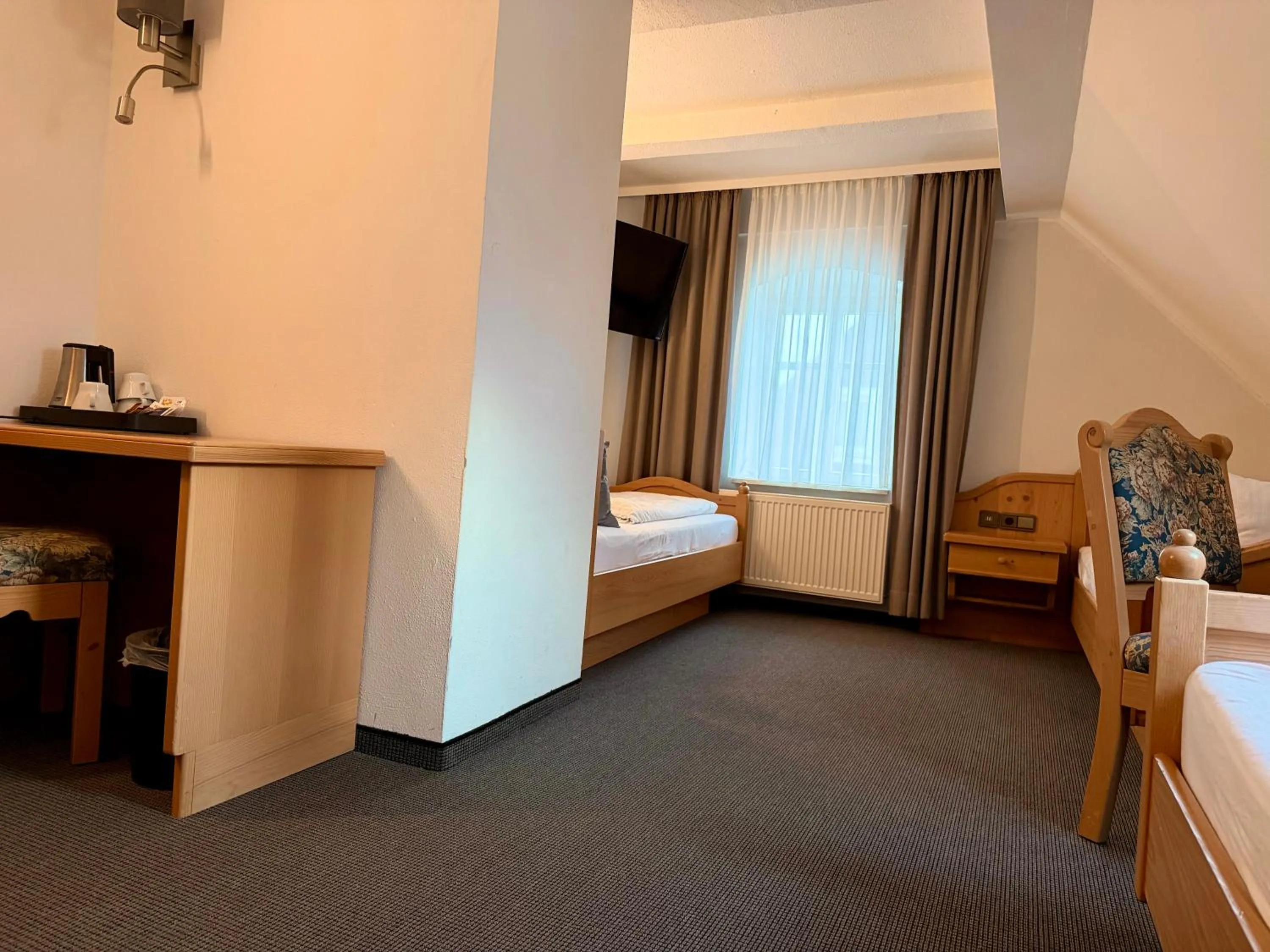 Bed in Gasthof Hotel Bräustübl und Haus Boutique