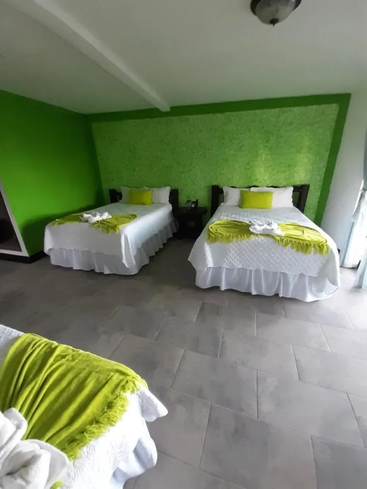 Bed in Hotel Mi Paraíso Río Dulce