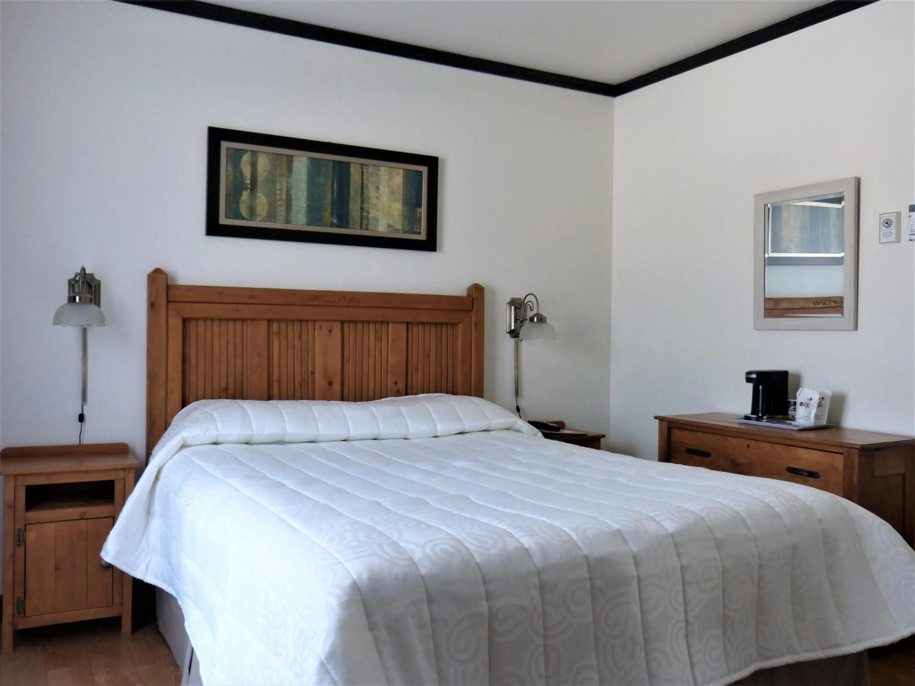 Bed in Auberge Du Lac Malcom