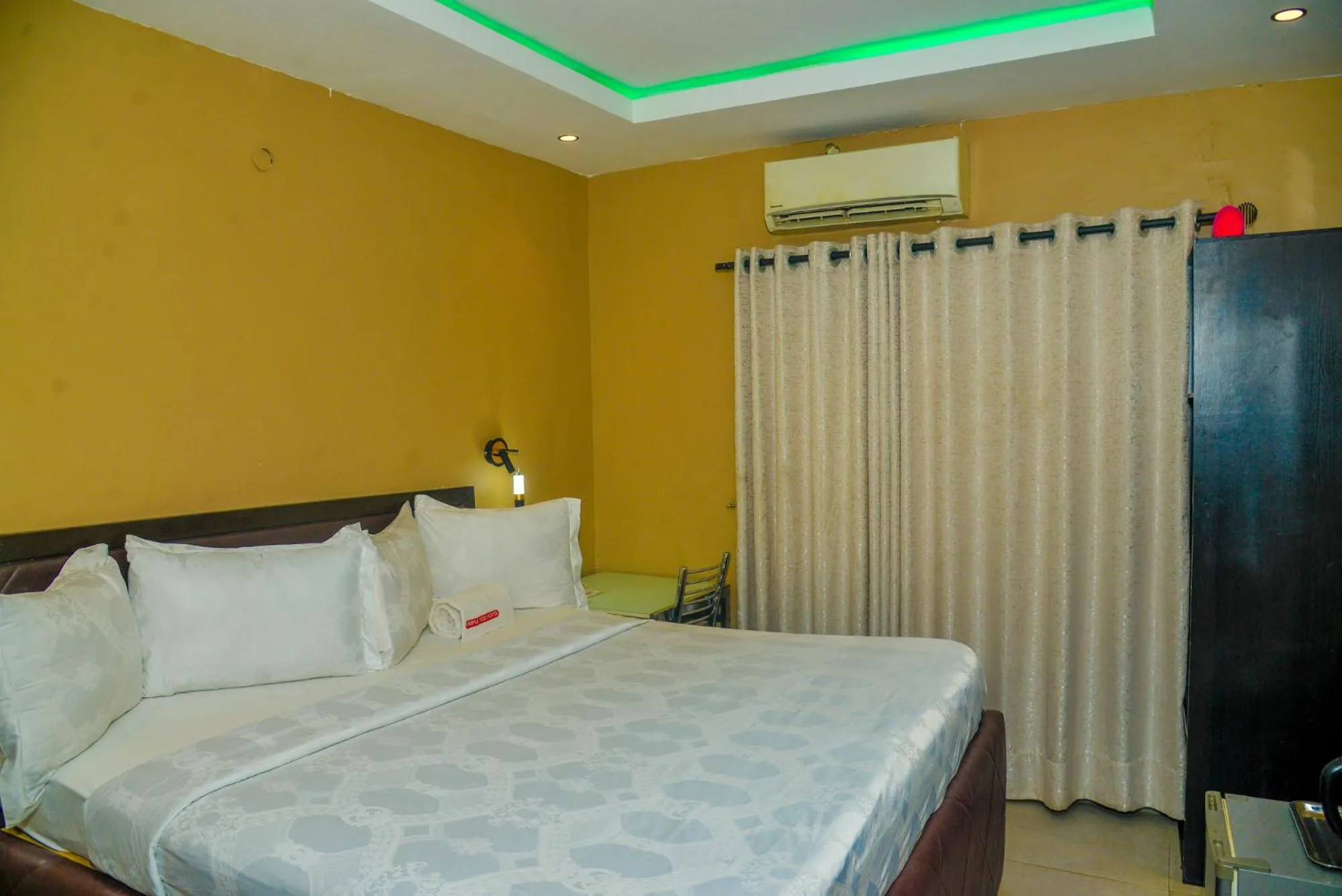 Triple Tee Hotel