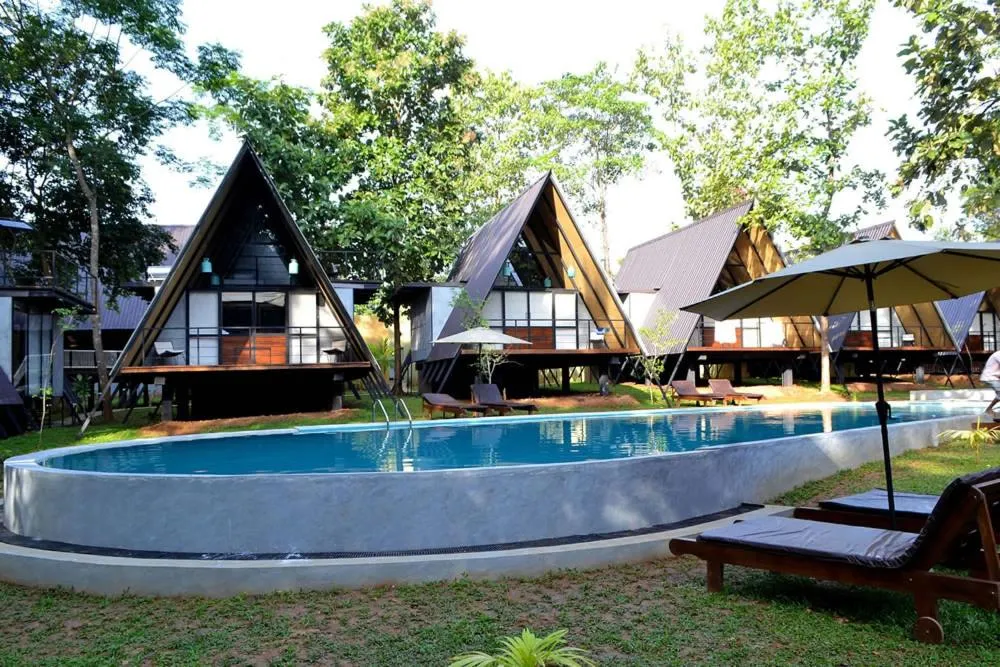 Swimming pool in Kottawatta River Bank Resort