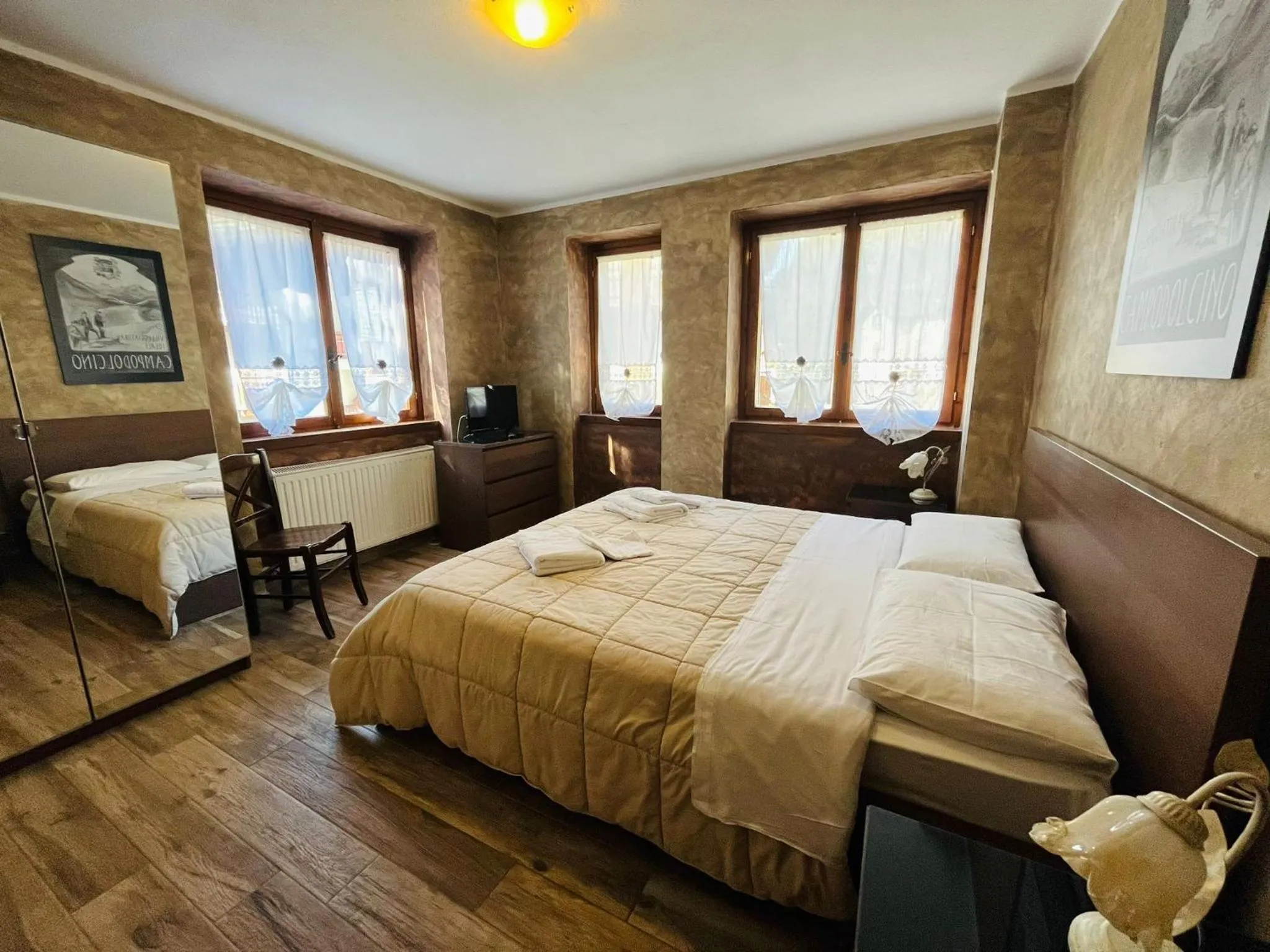 Bed in San Luigi - Rooms & Apartments