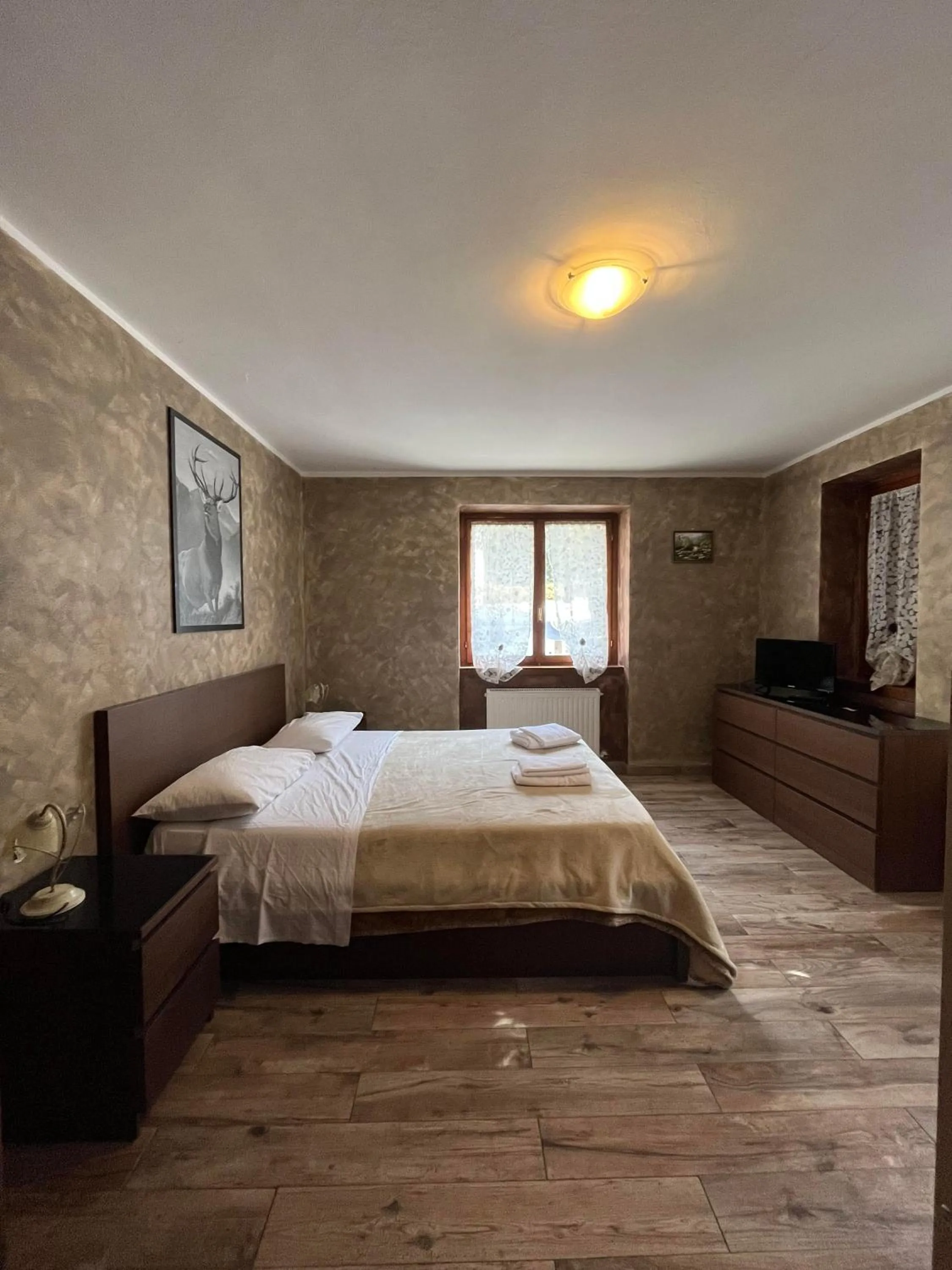 Bed in San Luigi - Rooms & Apartments