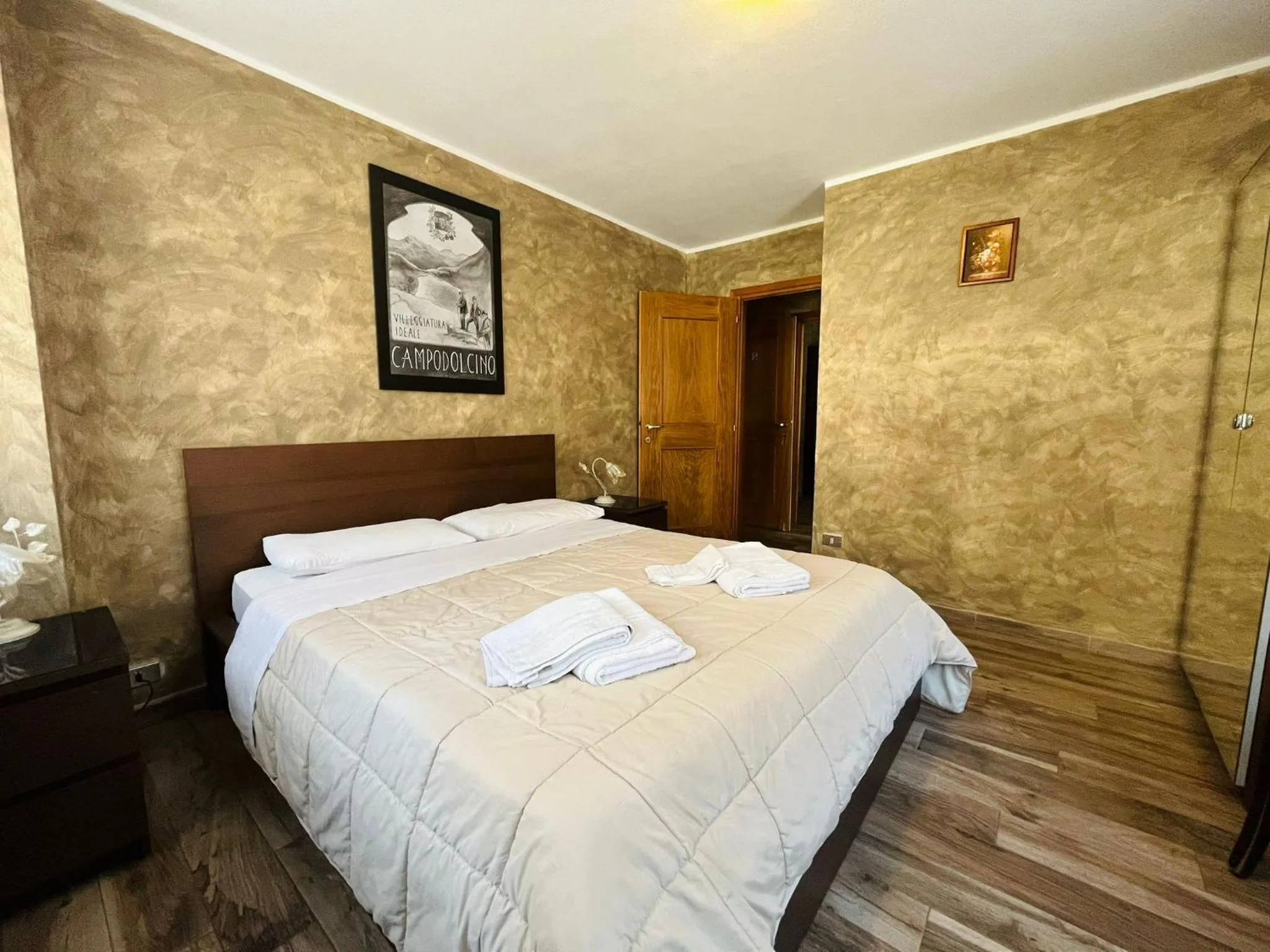 Bed in San Luigi - Rooms & Apartments