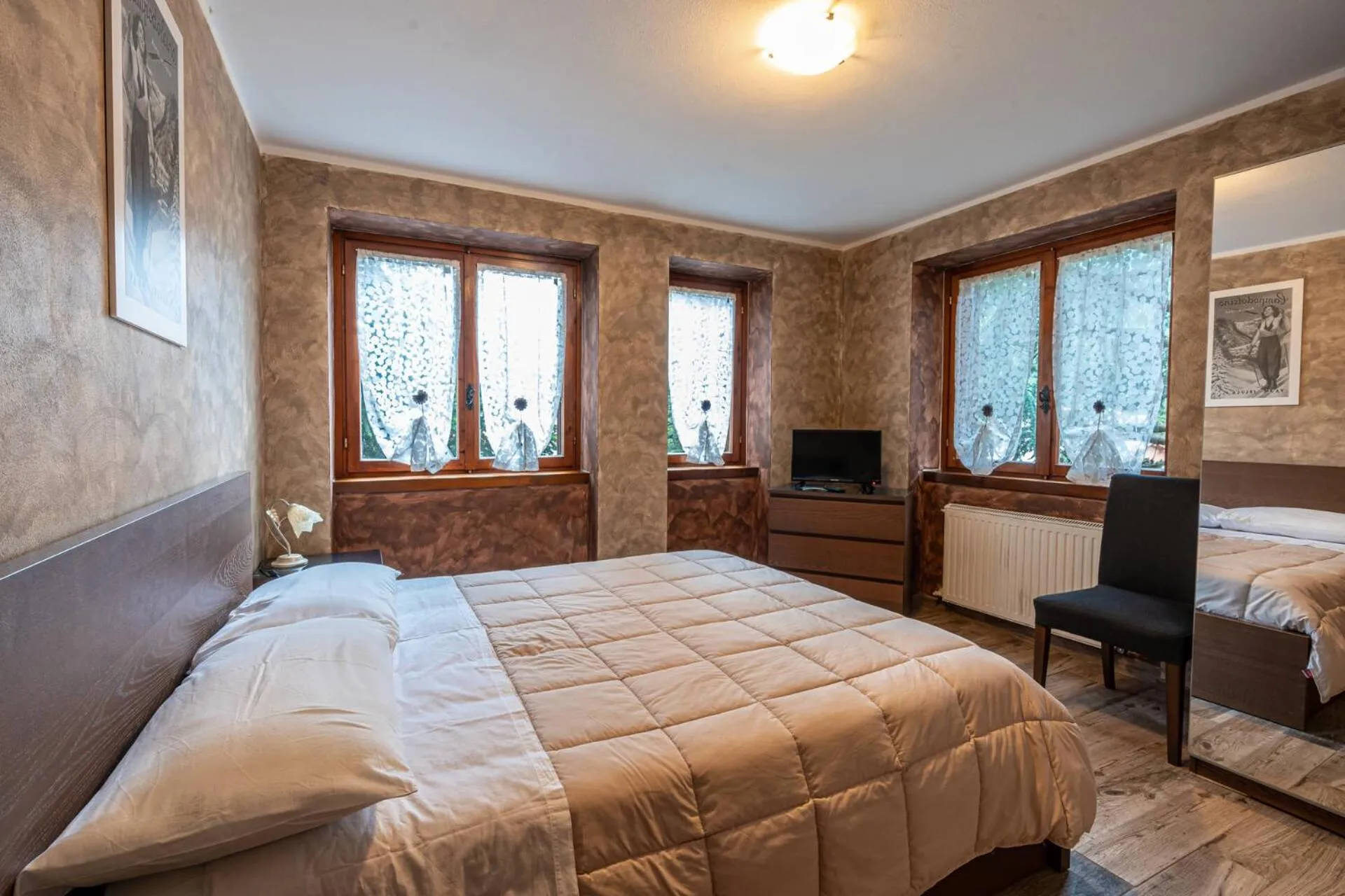 Bed in San Luigi - Rooms & Apartments