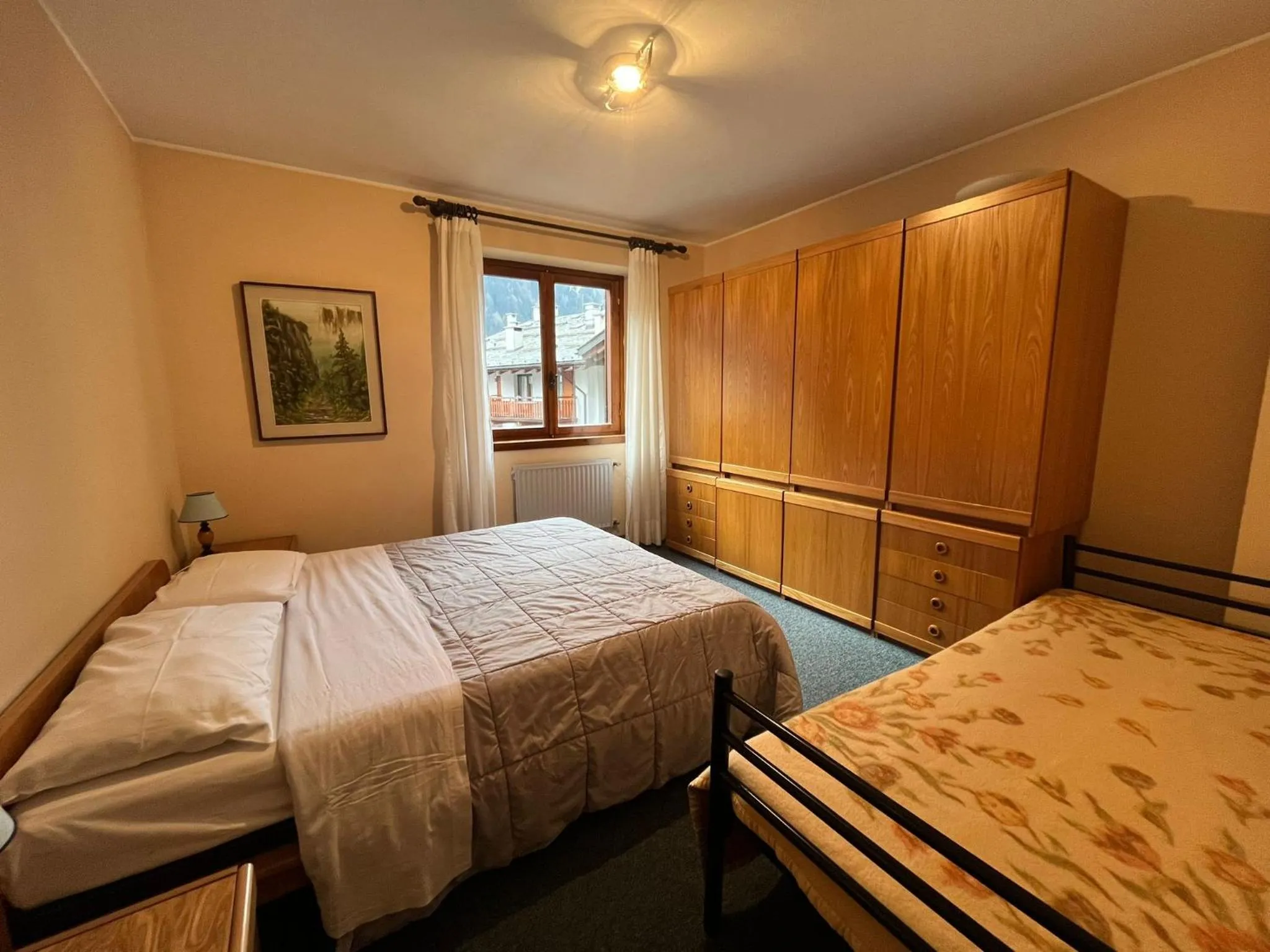 Bed in San Luigi - Rooms & Apartments