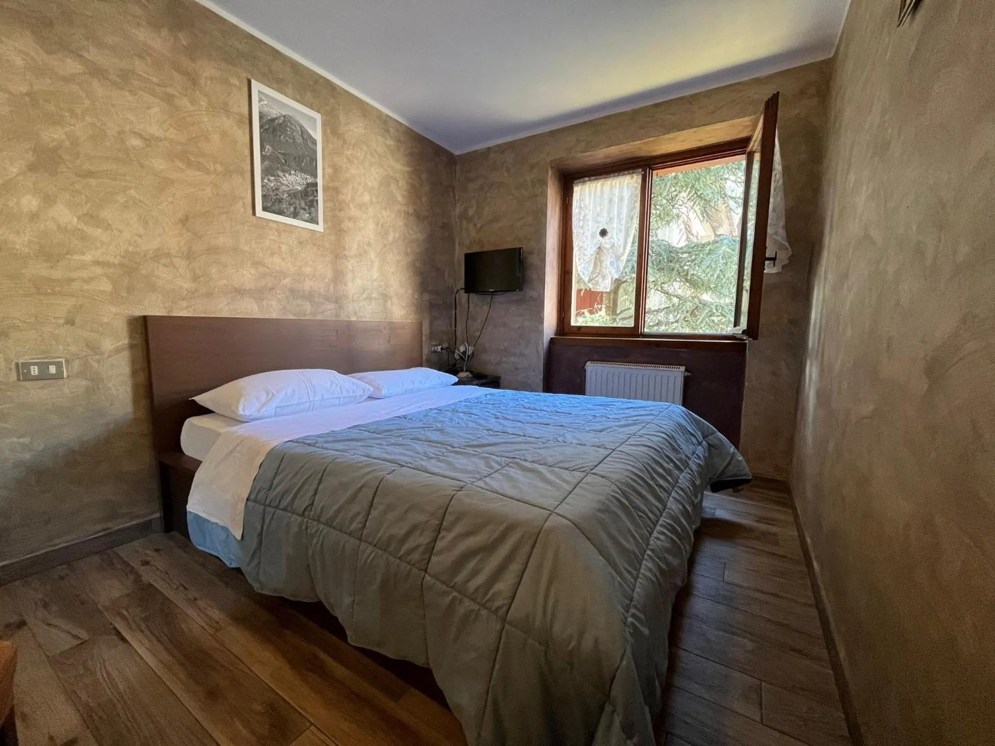 Bed in San Luigi - Rooms & Apartments