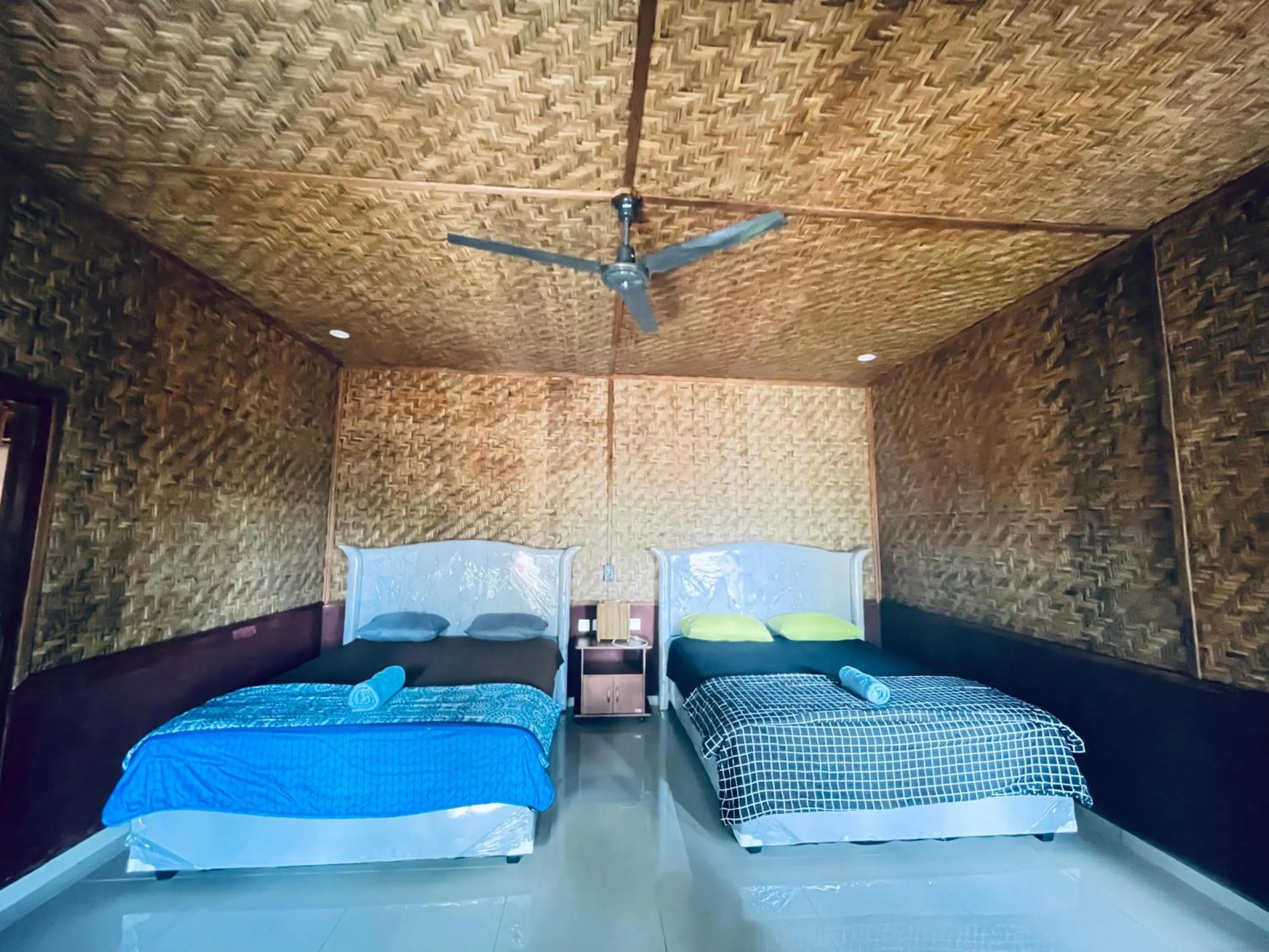 Bed in Wina Wani Bungalows Tetebatu
