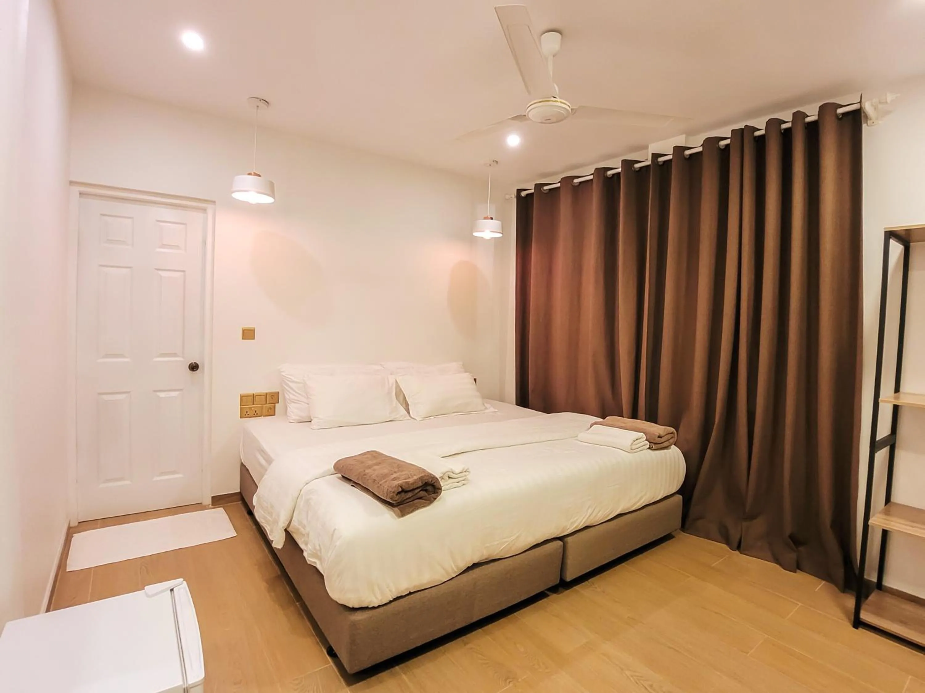 Photo of the whole room, Bed in KingsWay Thoddoo Maldives