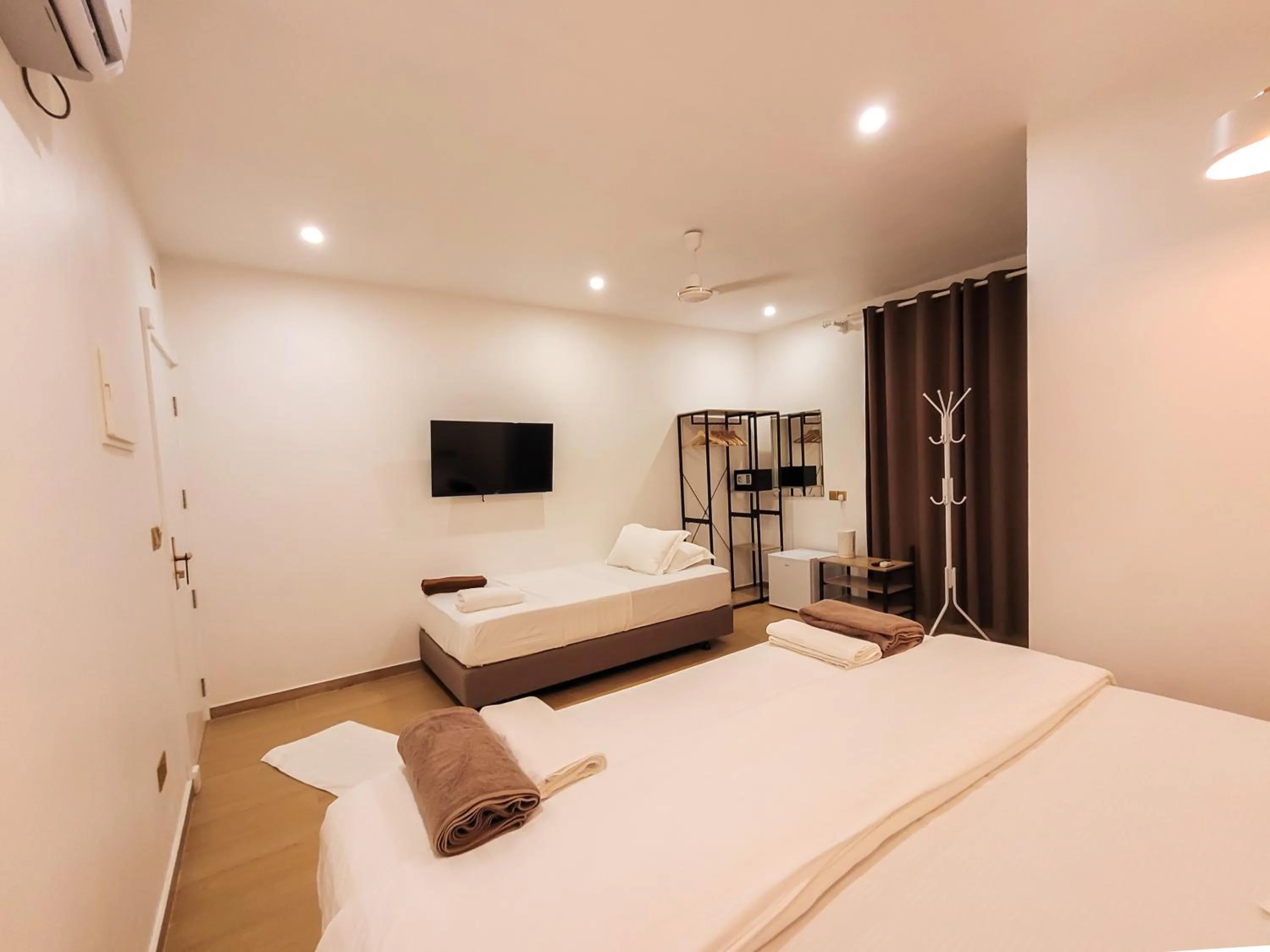 Photo of the whole room, Bed in KingsWay Thoddoo Maldives