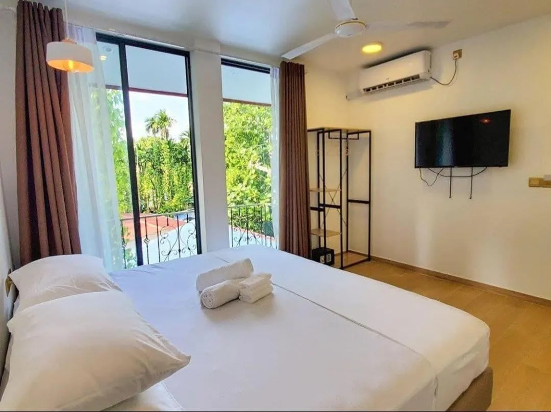 Bedroom, Bed in KingsWay Thoddoo Maldives