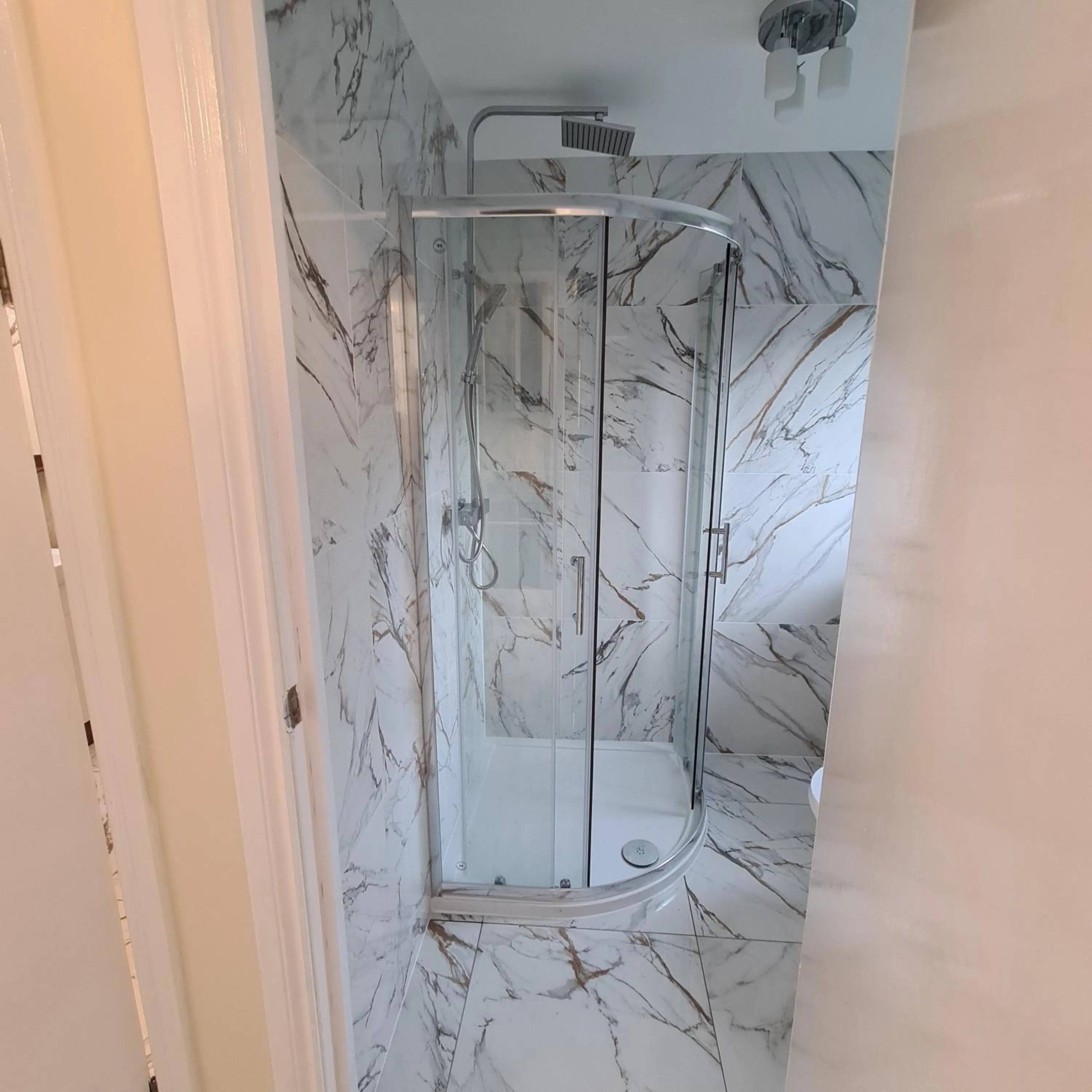 Shower in Umbrella Properties London Excel