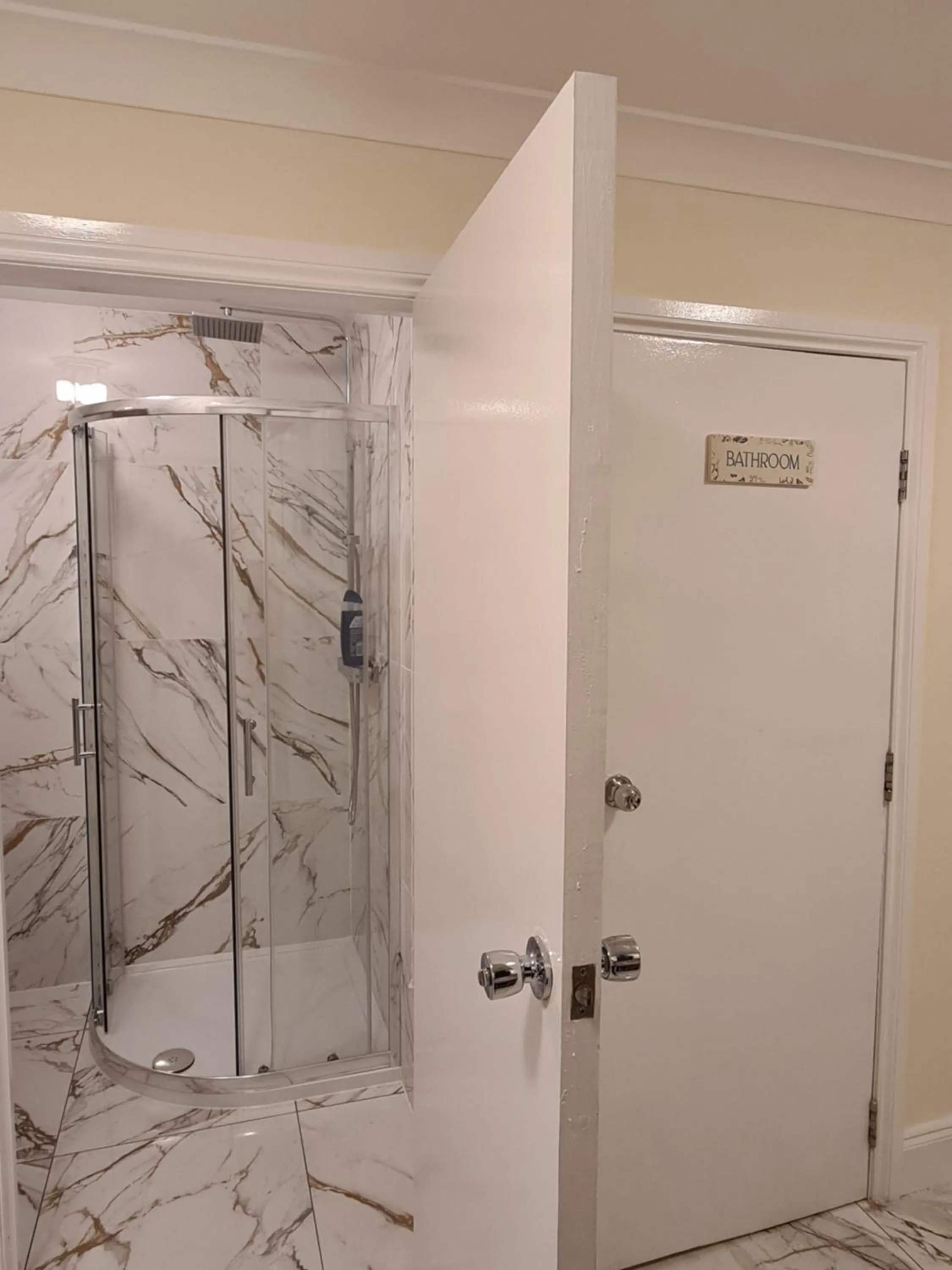 Shower in Umbrella Properties London Excel