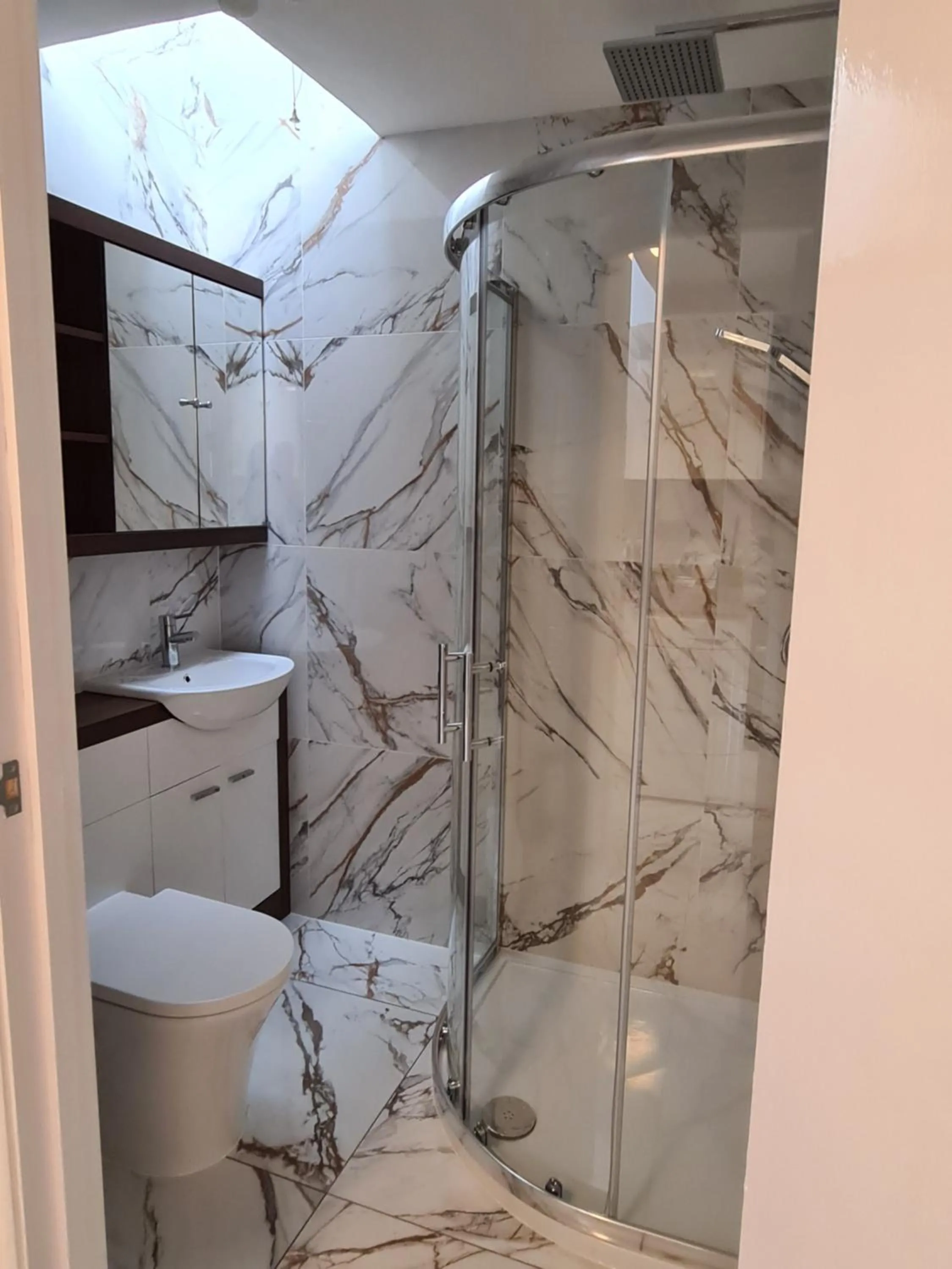 Shower in Umbrella Properties London Excel