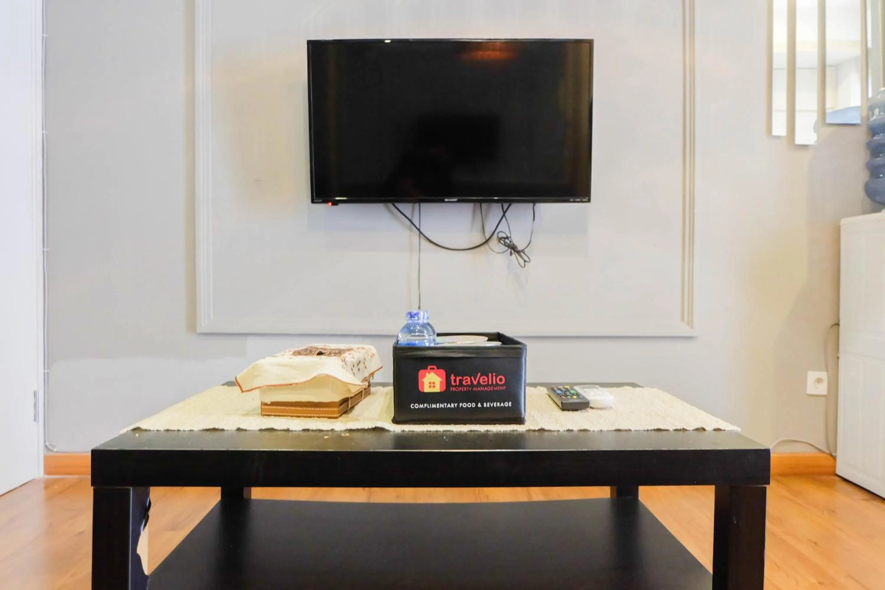 Exclusive and Spacious 1BR Apartment at Bassura City By Travelio