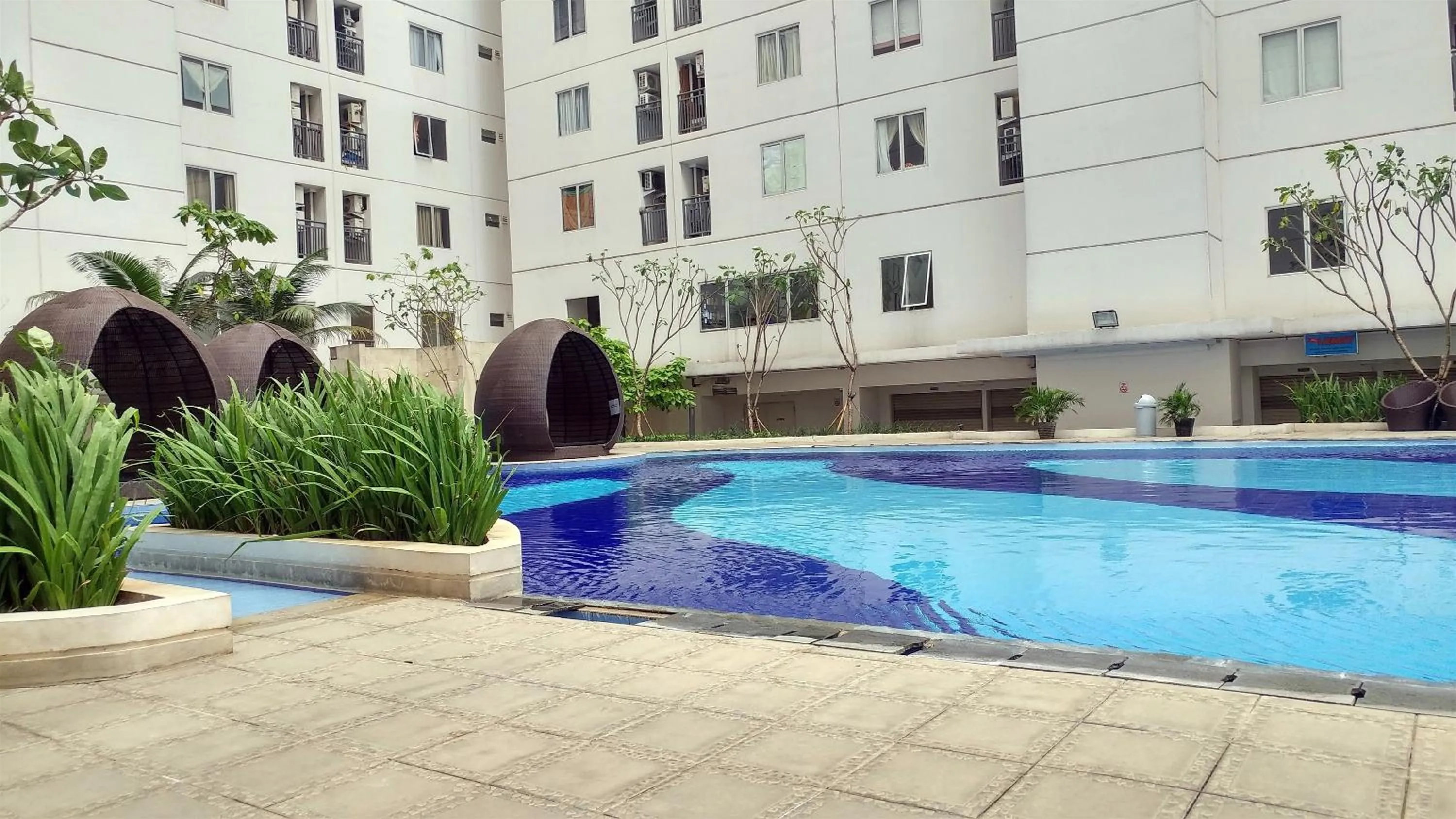 Exclusive and Spacious 1BR Apartment at Bassura City By Travelio