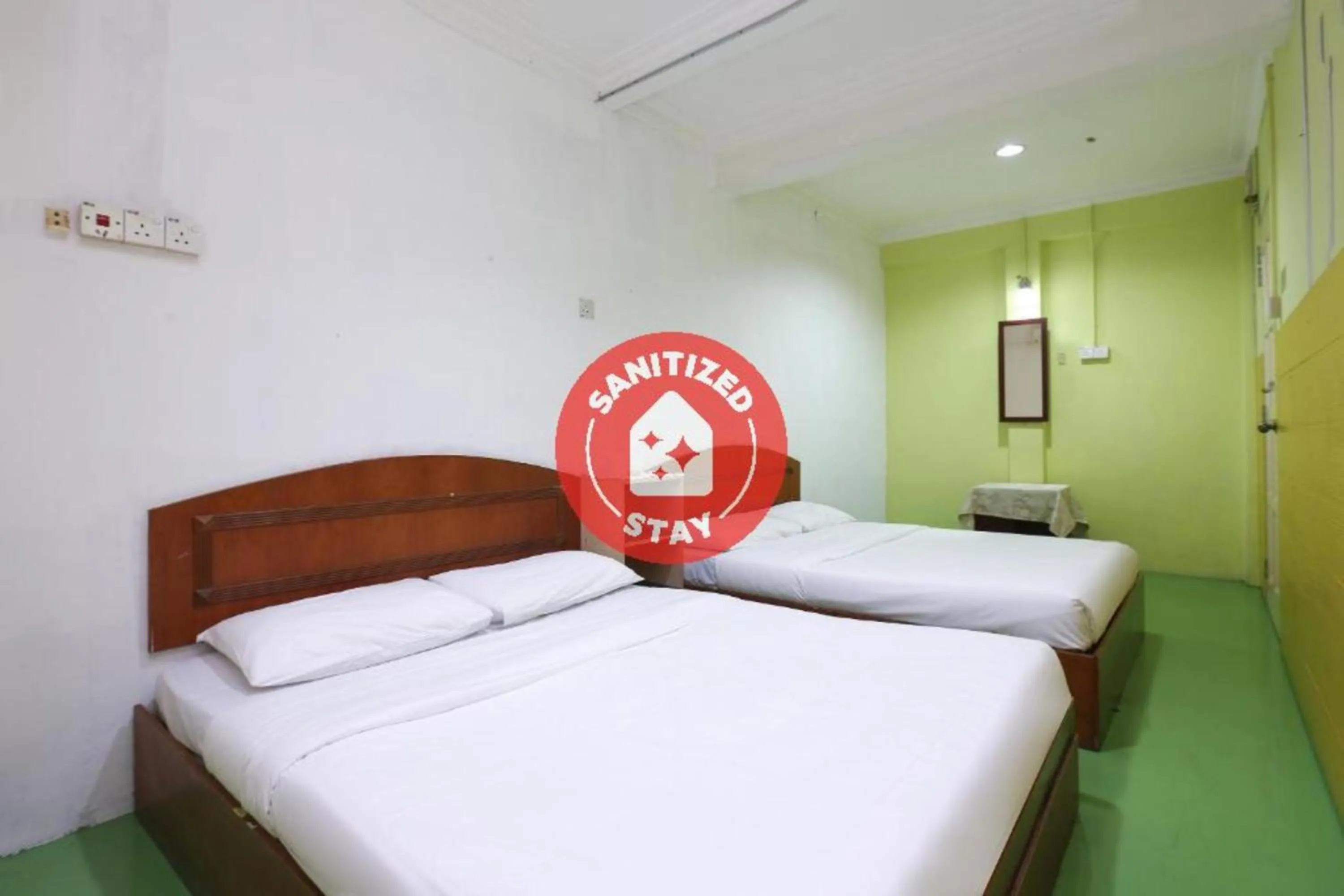 Bed in Impiana Hotel