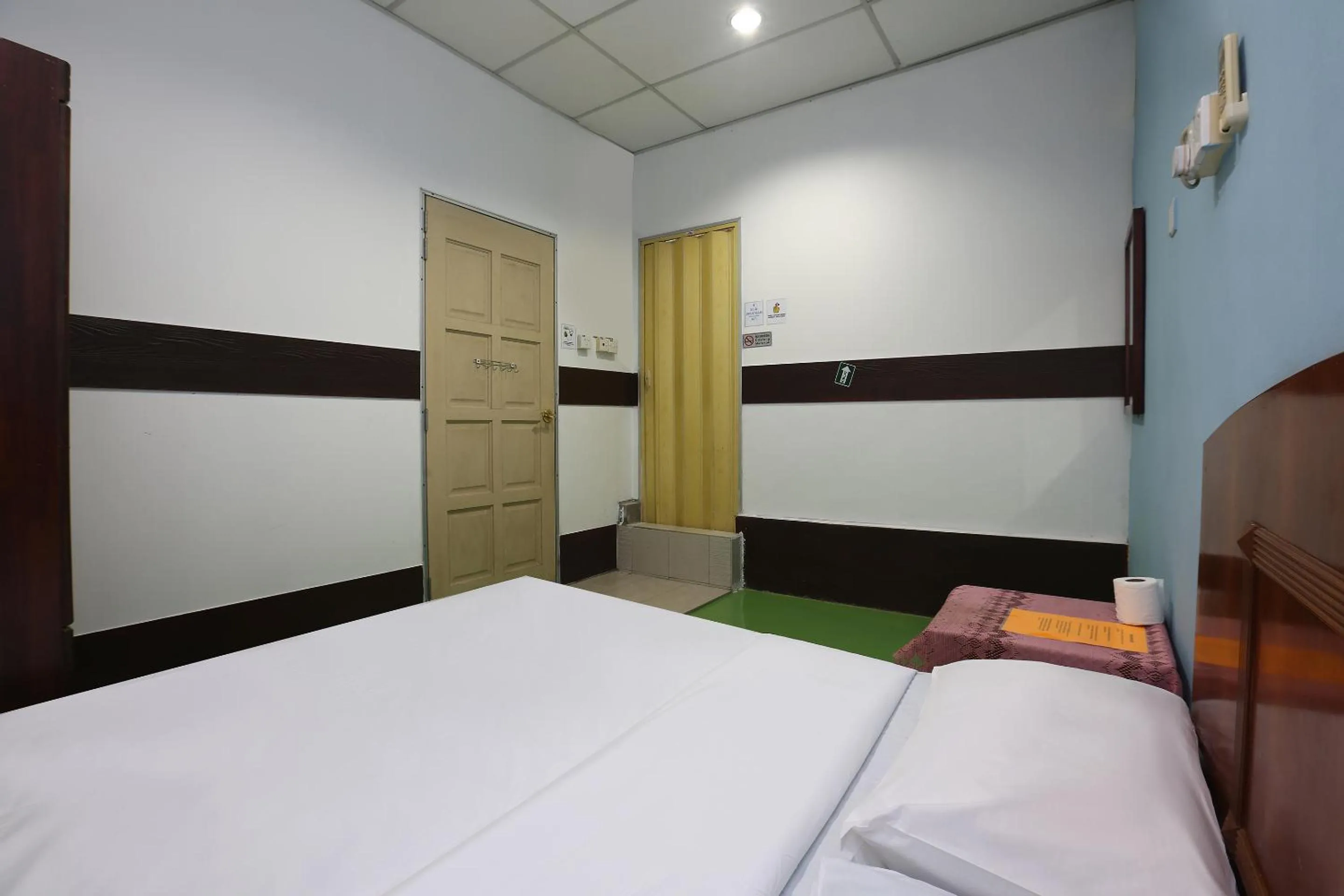 Bed in Impiana Hotel