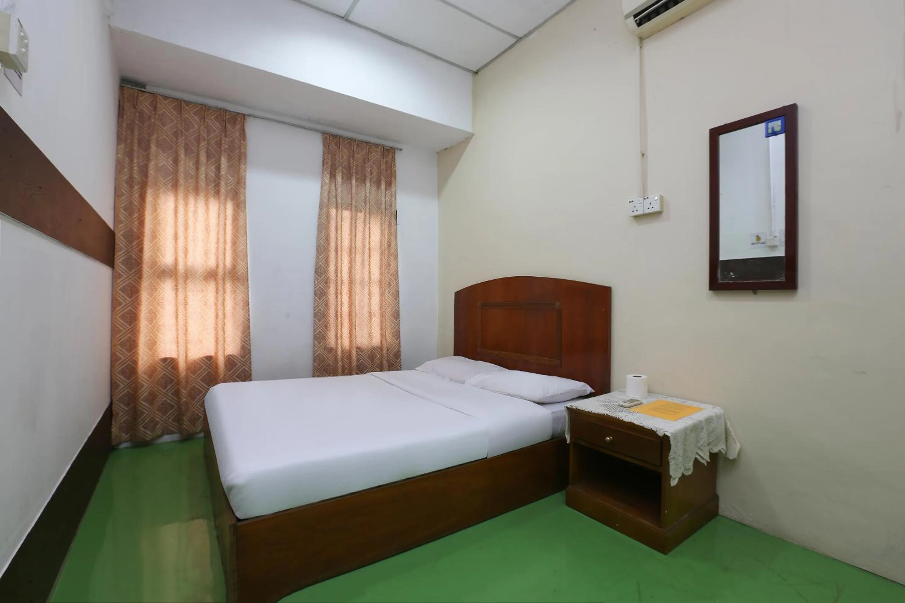 Bed in Impiana Hotel