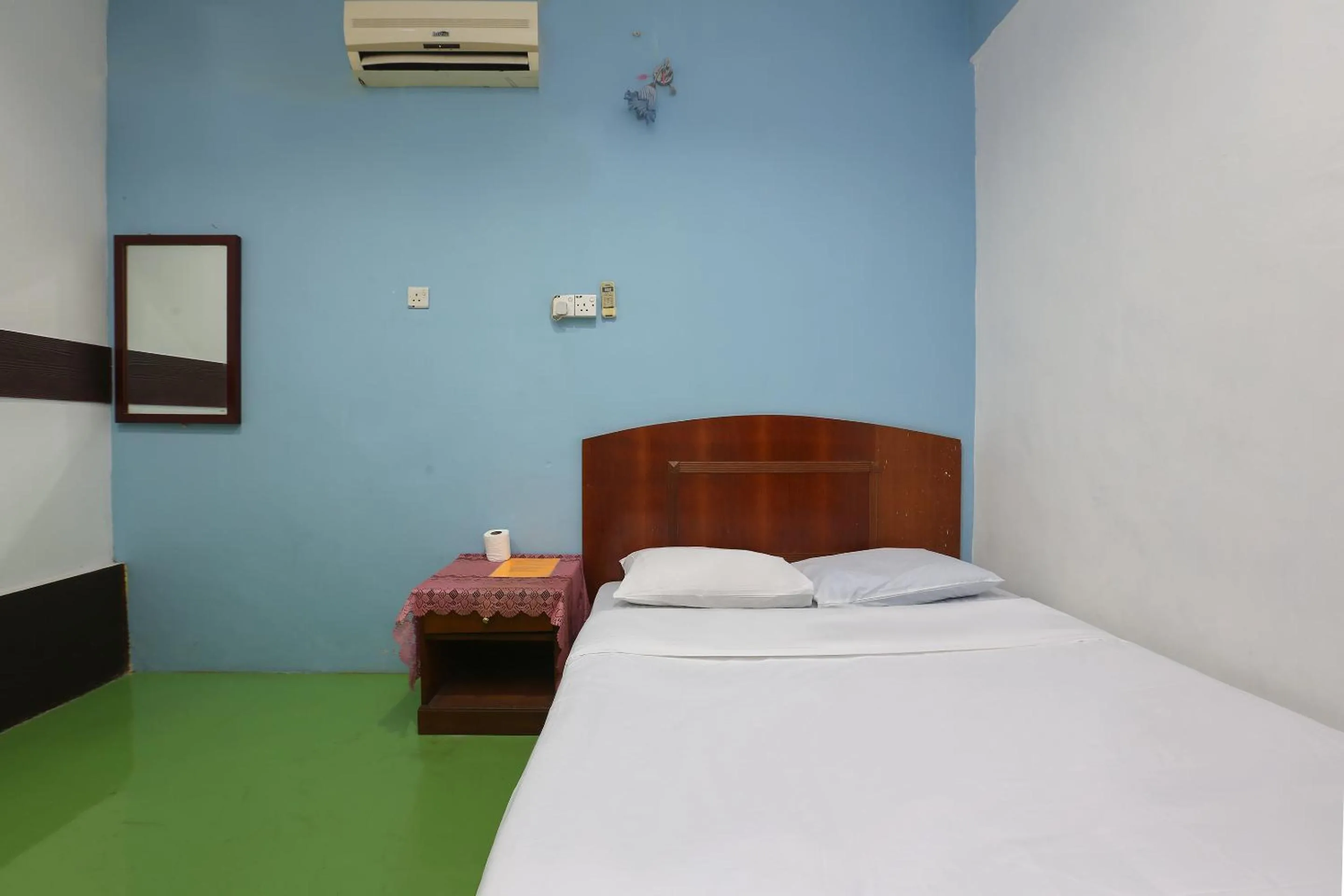 Bed in Impiana Hotel