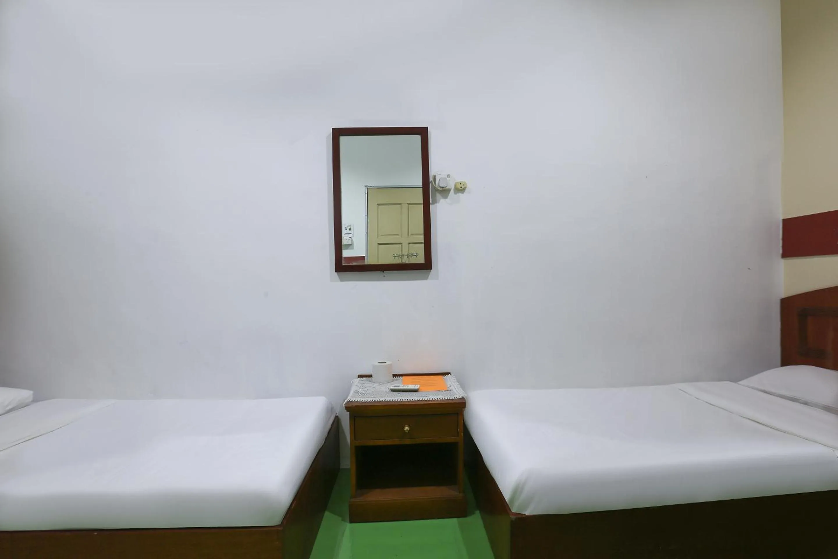 Bed in Impiana Hotel