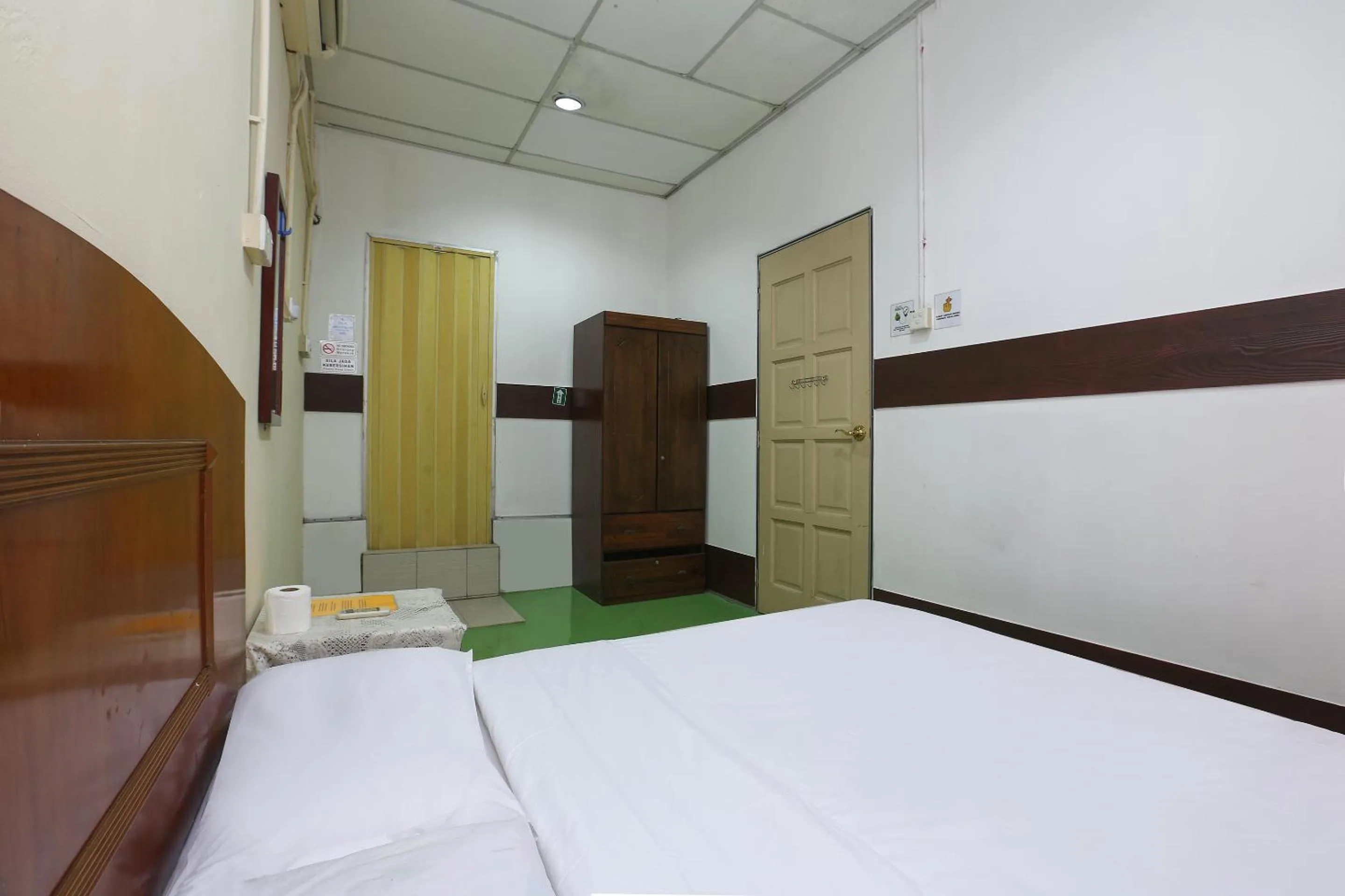 Bed in Impiana Hotel