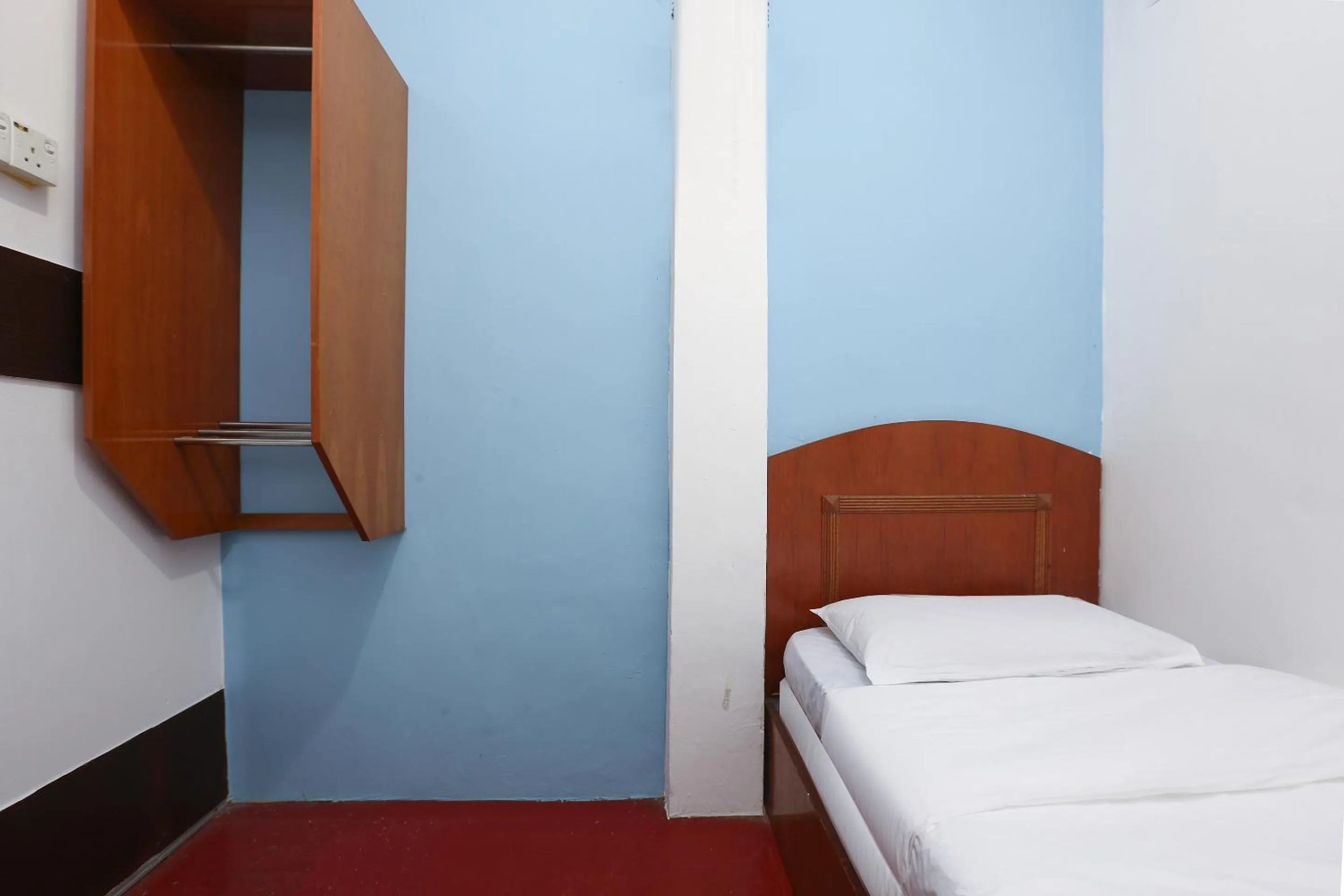 Bed in Impiana Hotel