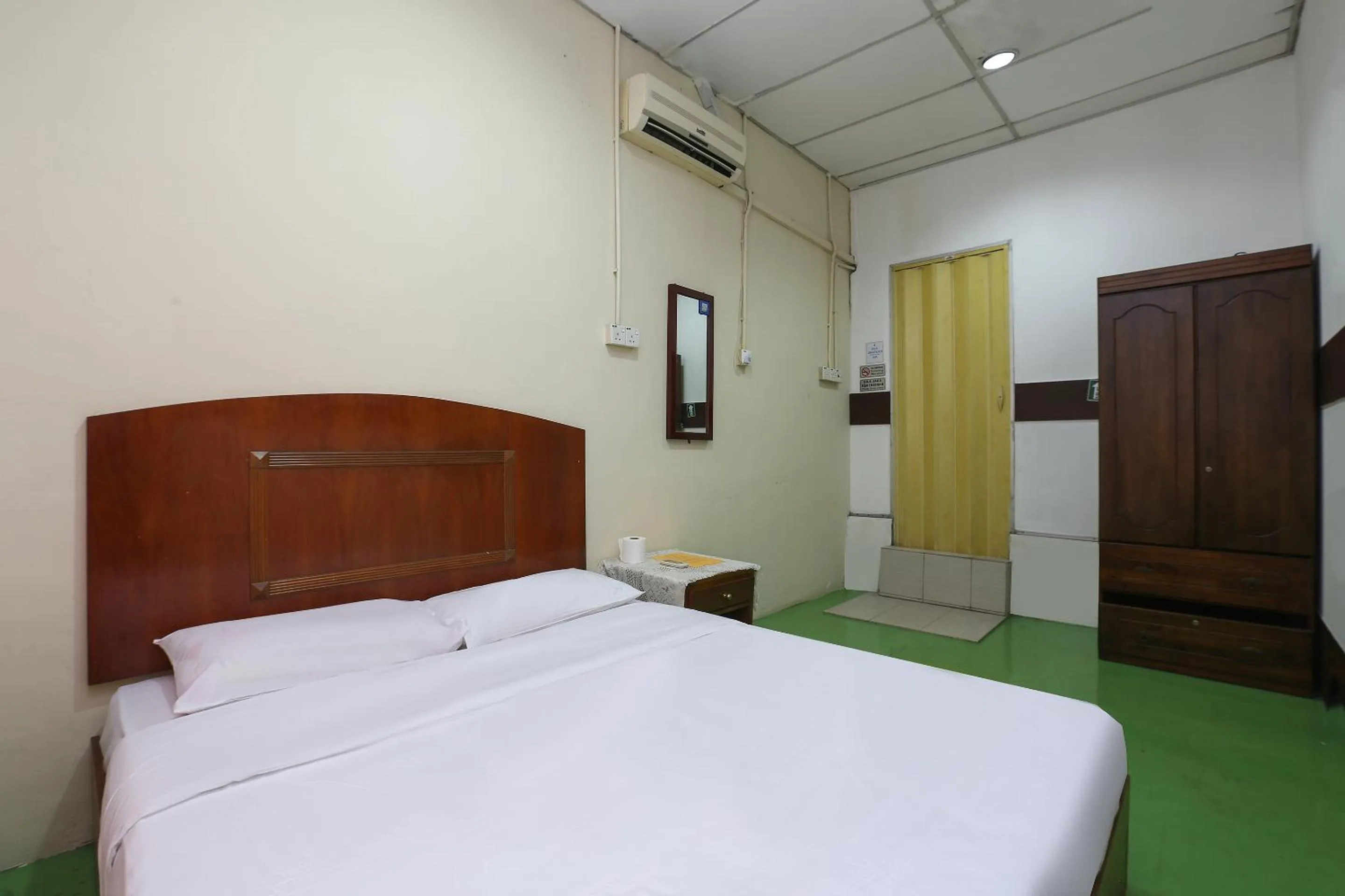 Bed in Impiana Hotel