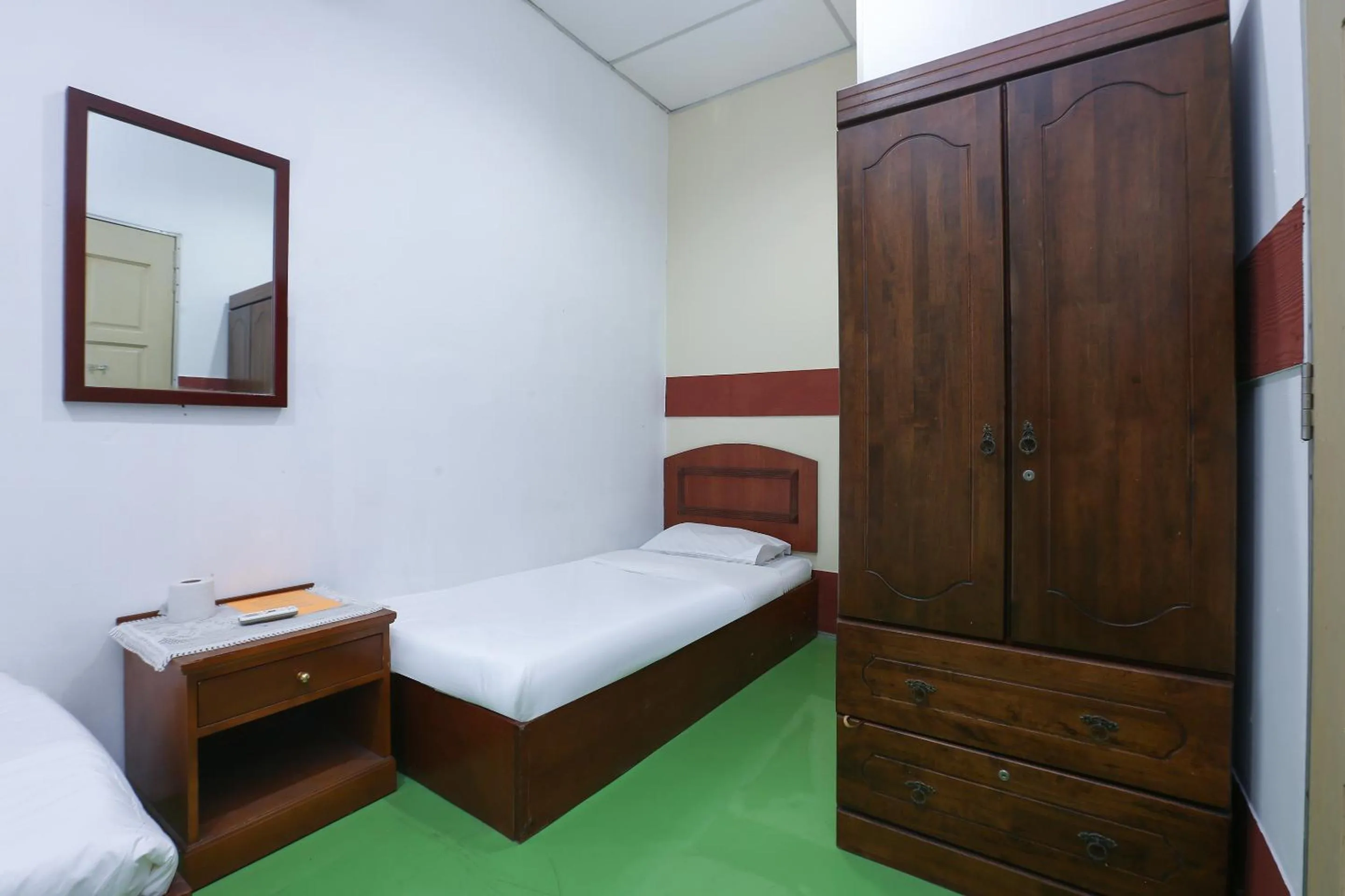 Bed in Impiana Hotel