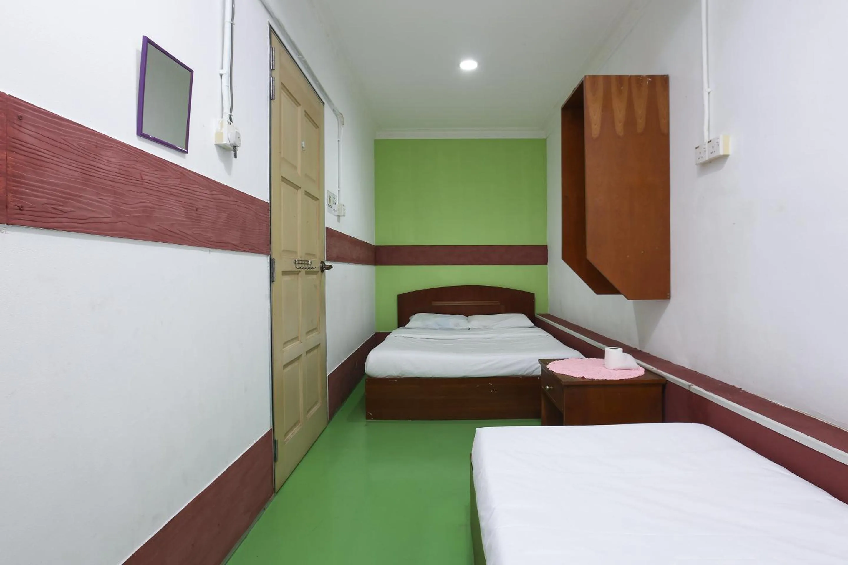 Bed in Impiana Hotel