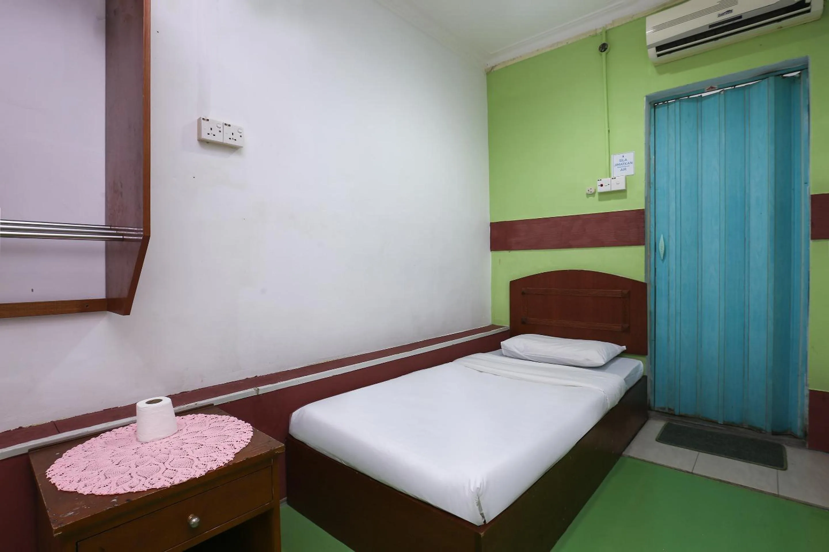 Bed in Impiana Hotel