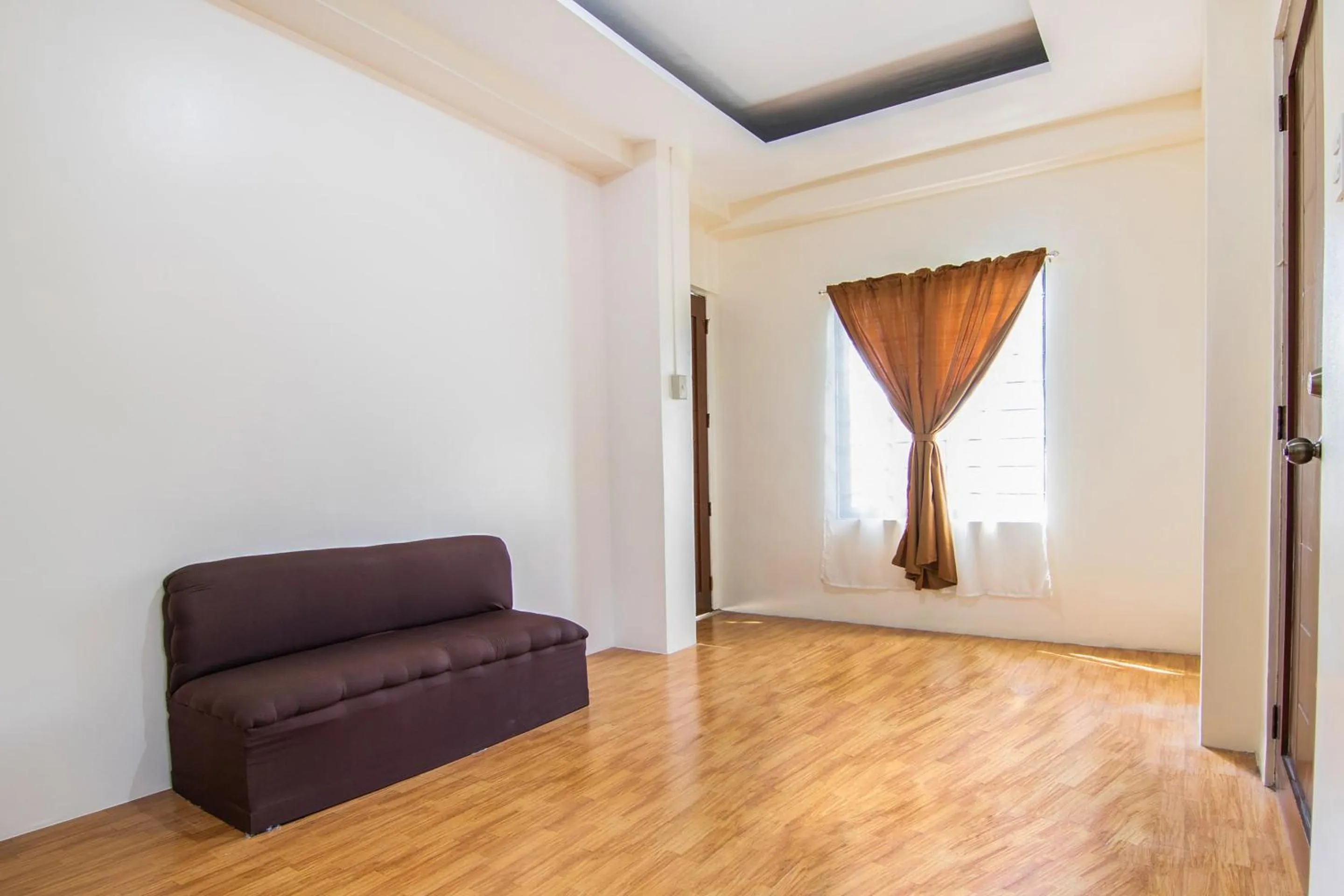 Bedroom in OYO 431 Apollo 11 Apartelle