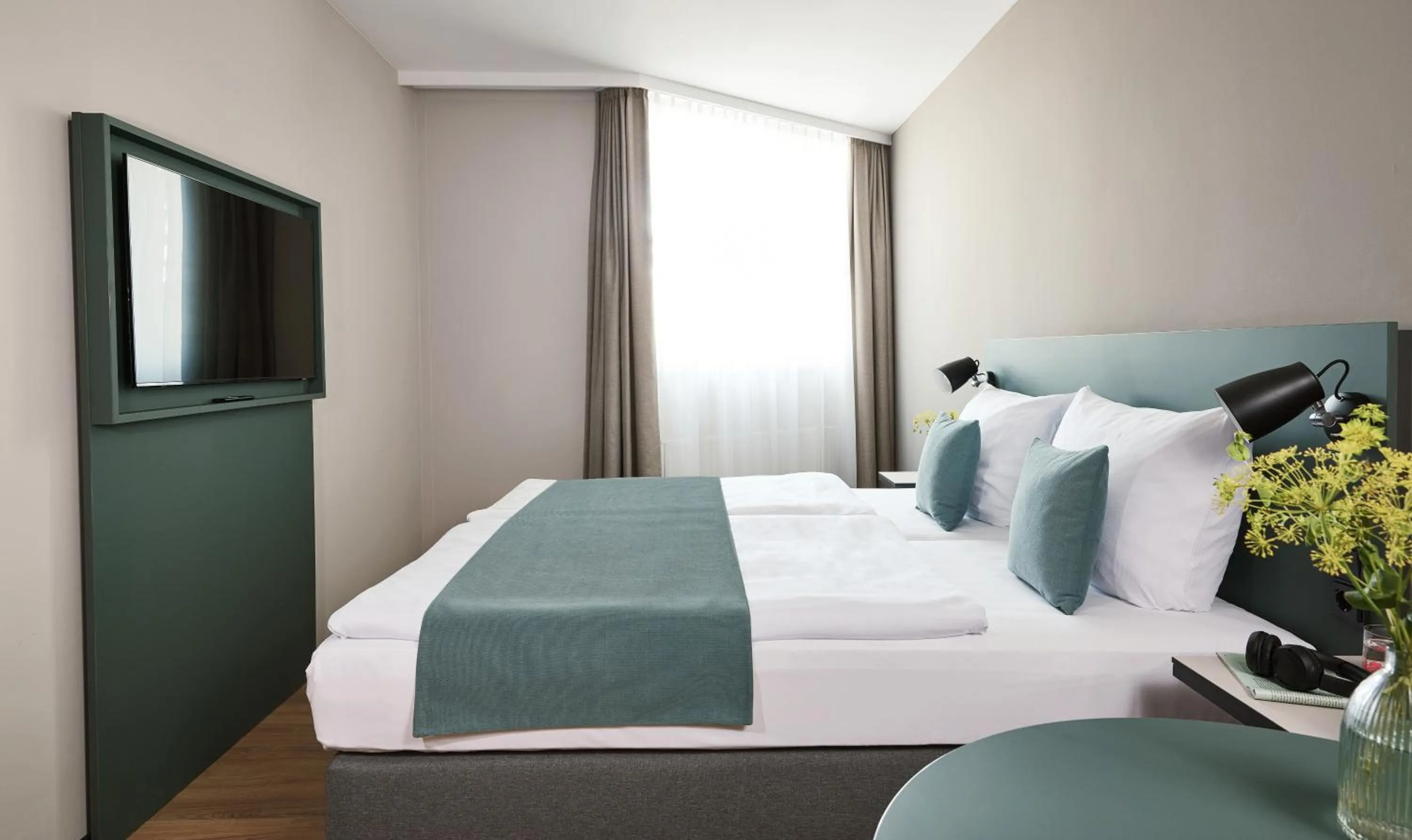 Bed in Living Hotel am Deutschen Museum