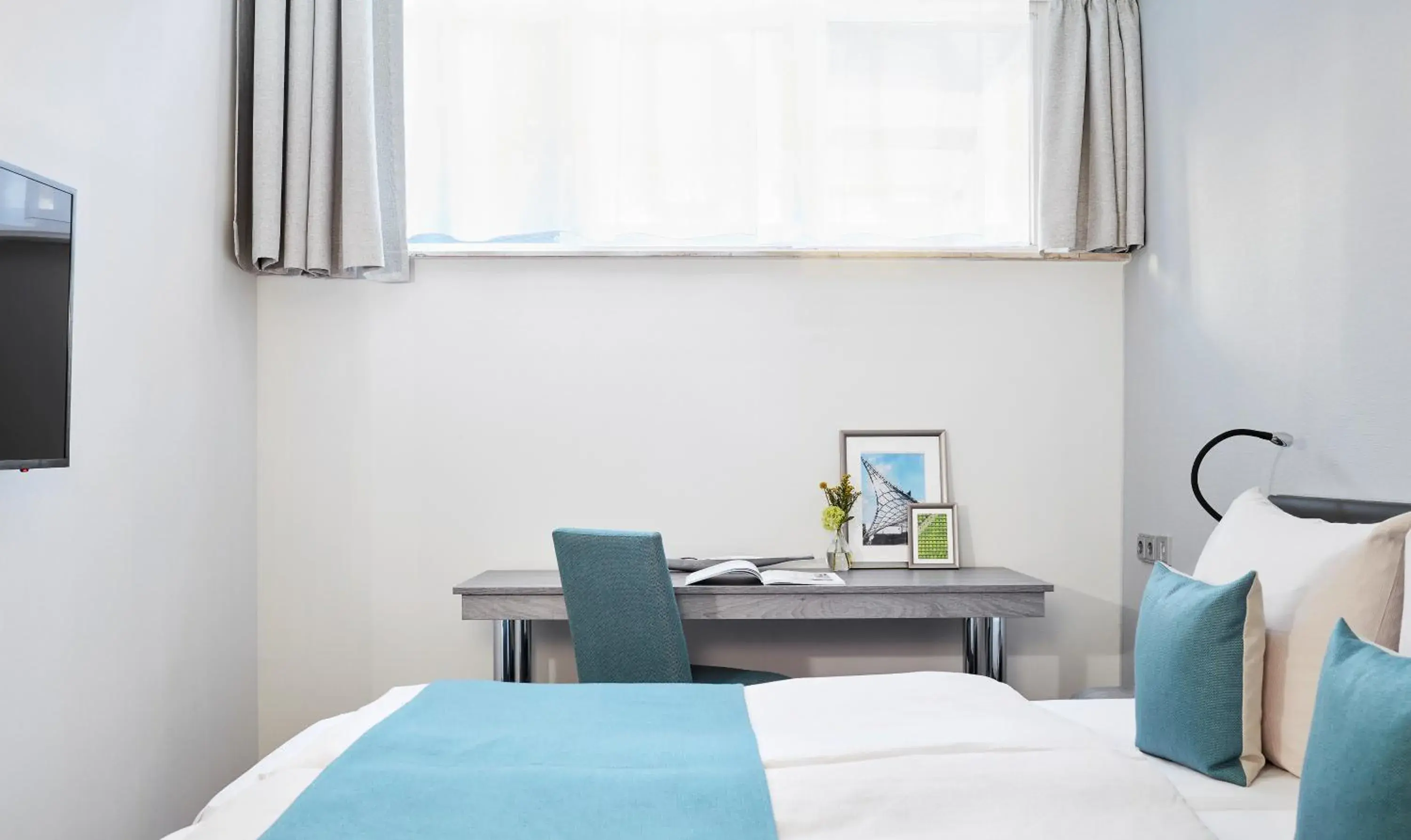 Bedroom, Bed in Living Hotel am Olympiapark Bedroom, Bed in Living Hotel am Olympiapark