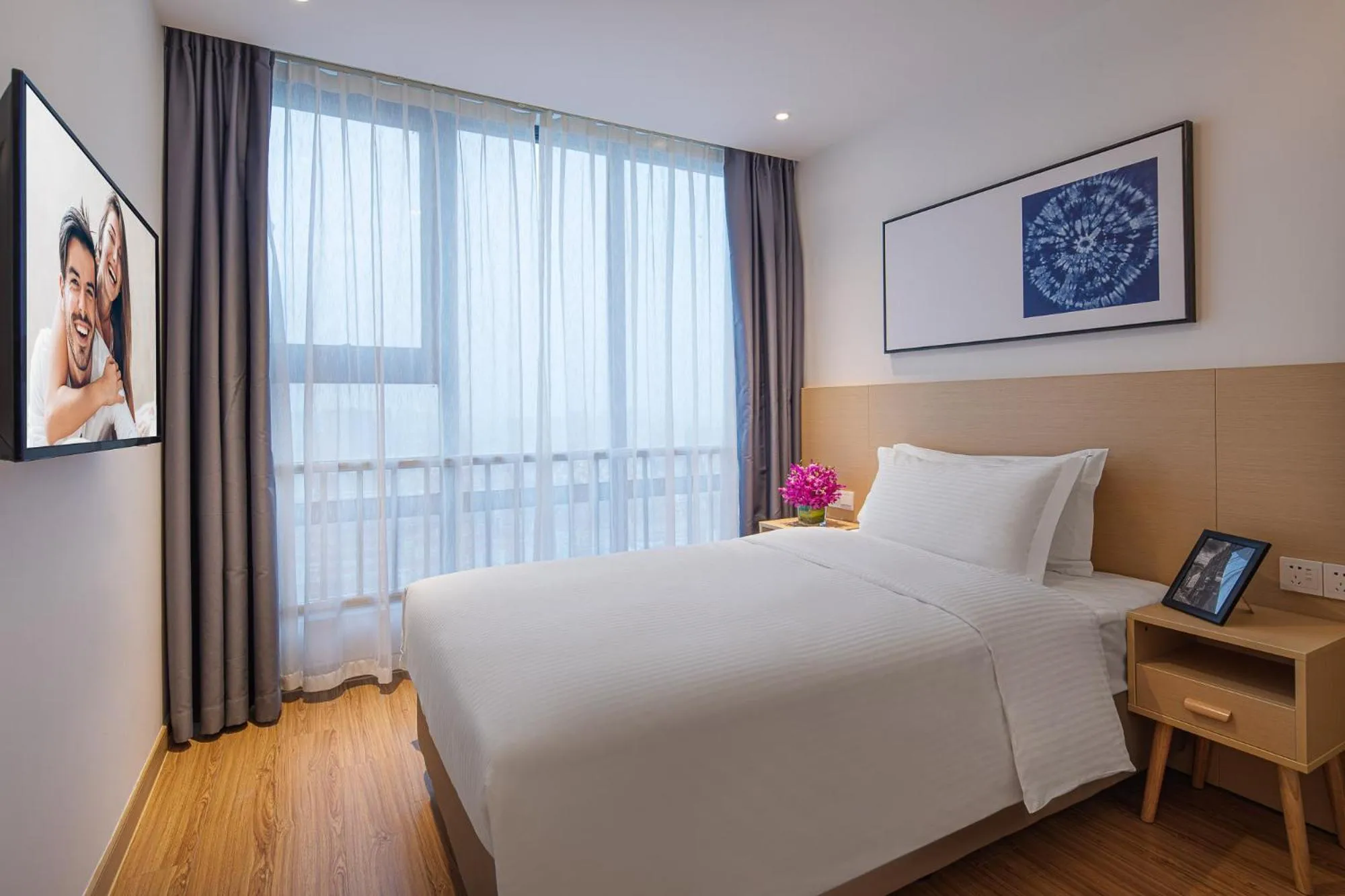 Bed in Joysuites Nantong