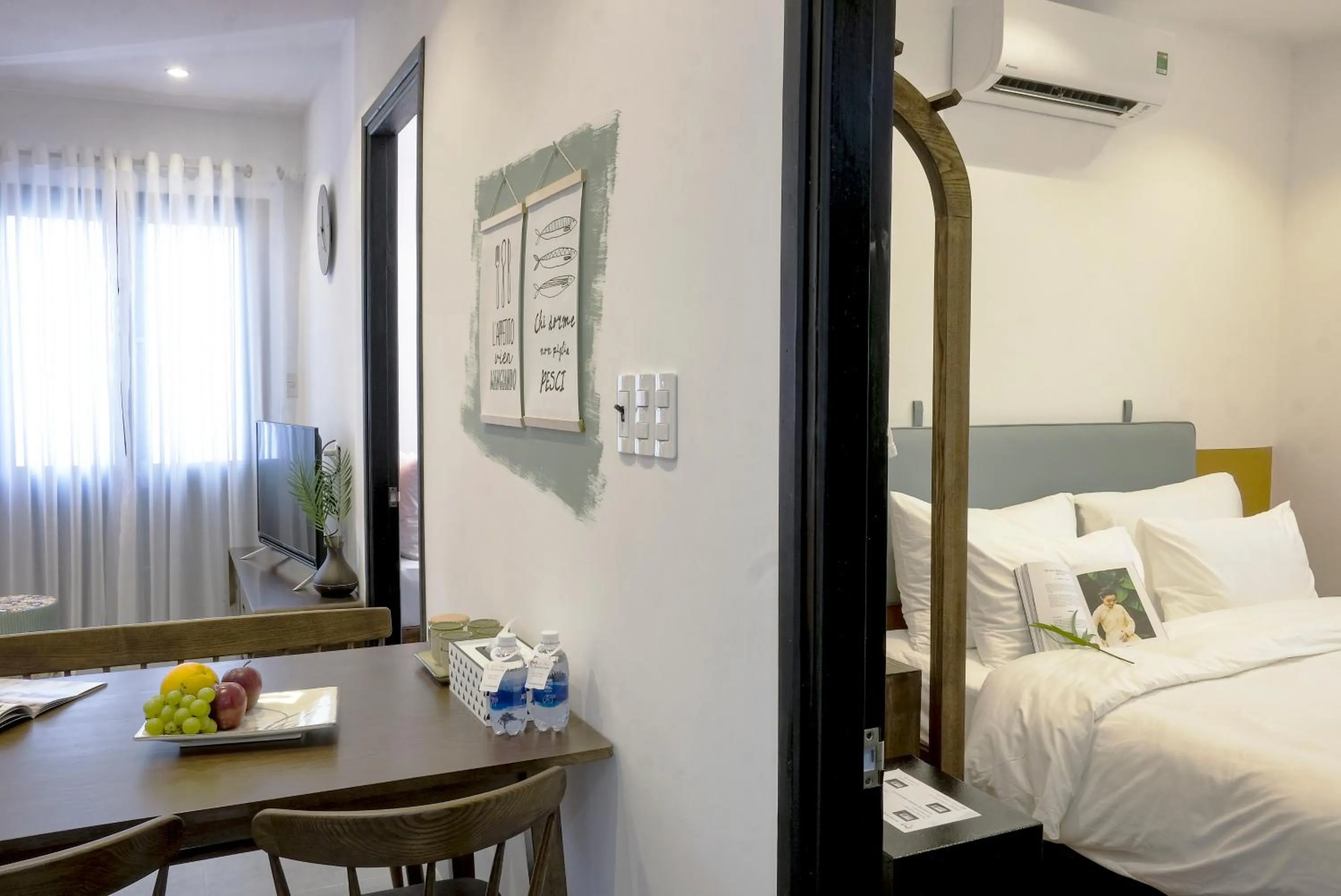 Living room, Bed in Quang Vinh Apartment and Hotel Hoi An