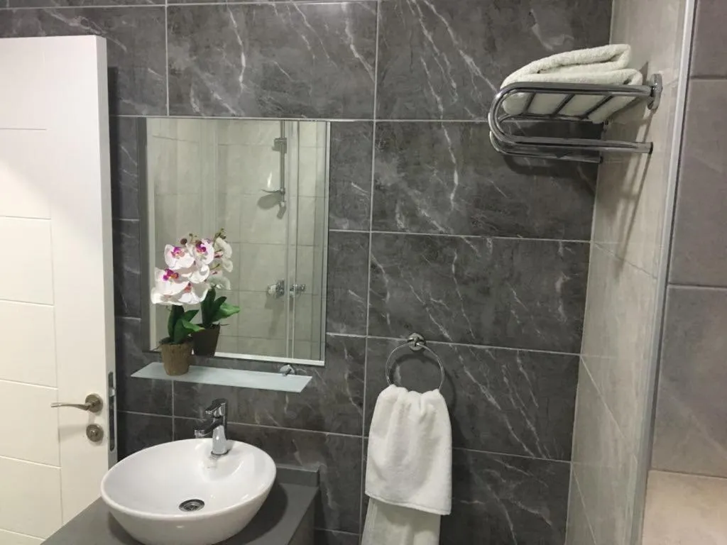 Bathroom in Alya Rooms