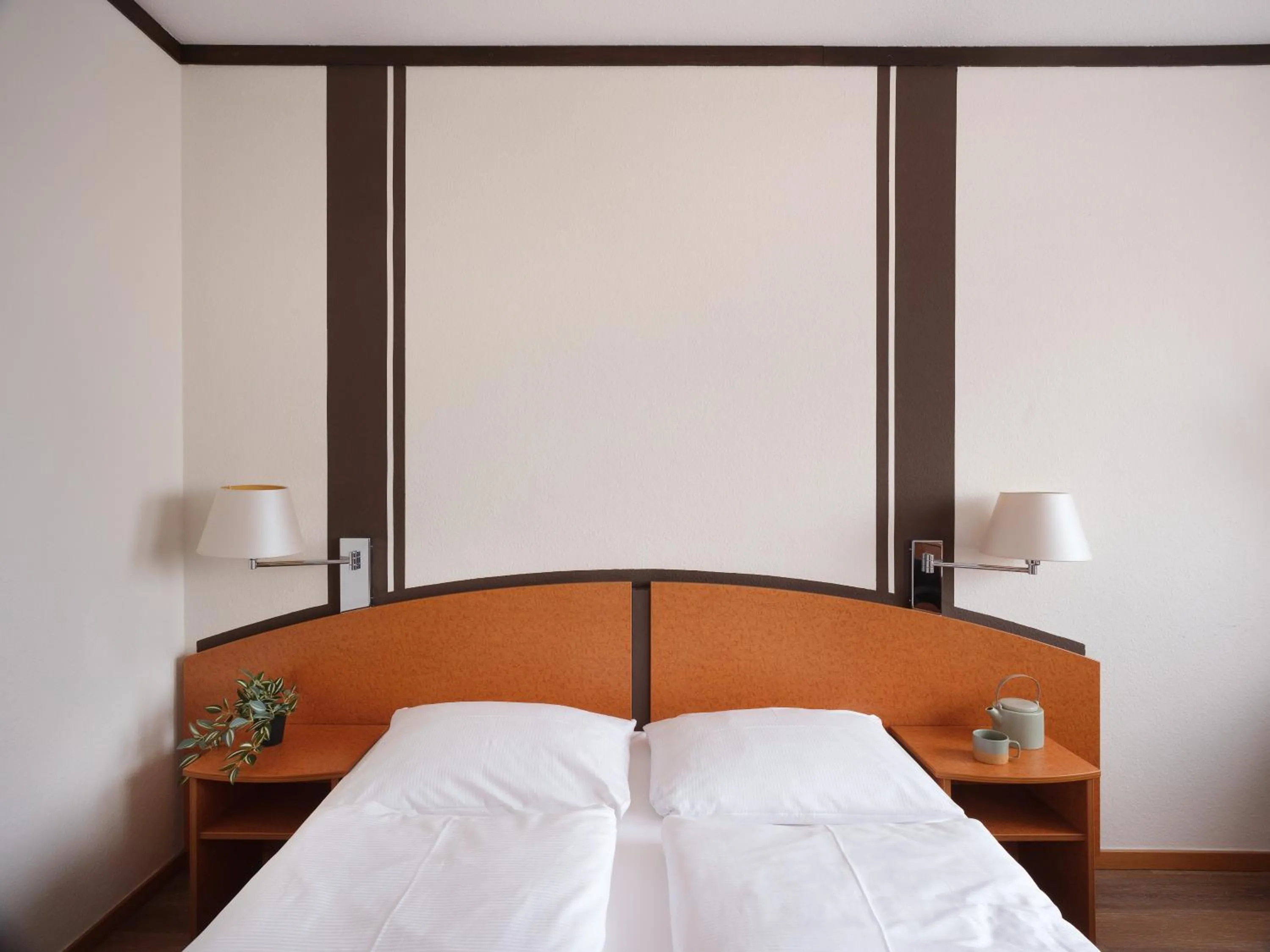 Bed in Mühlenhotel Halle-Leipzig