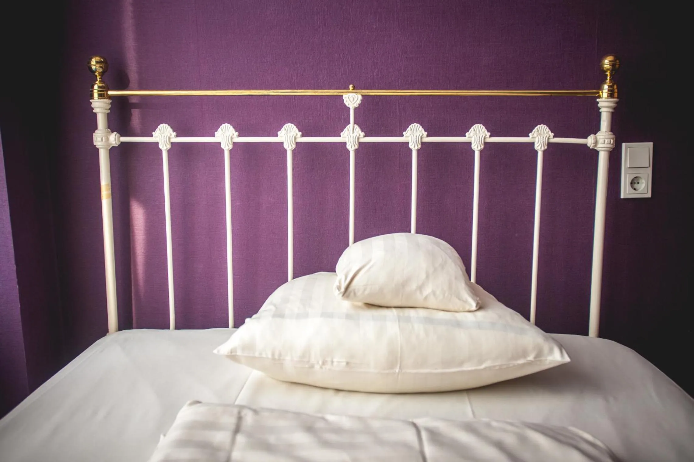 Bed in Hotel Alexander