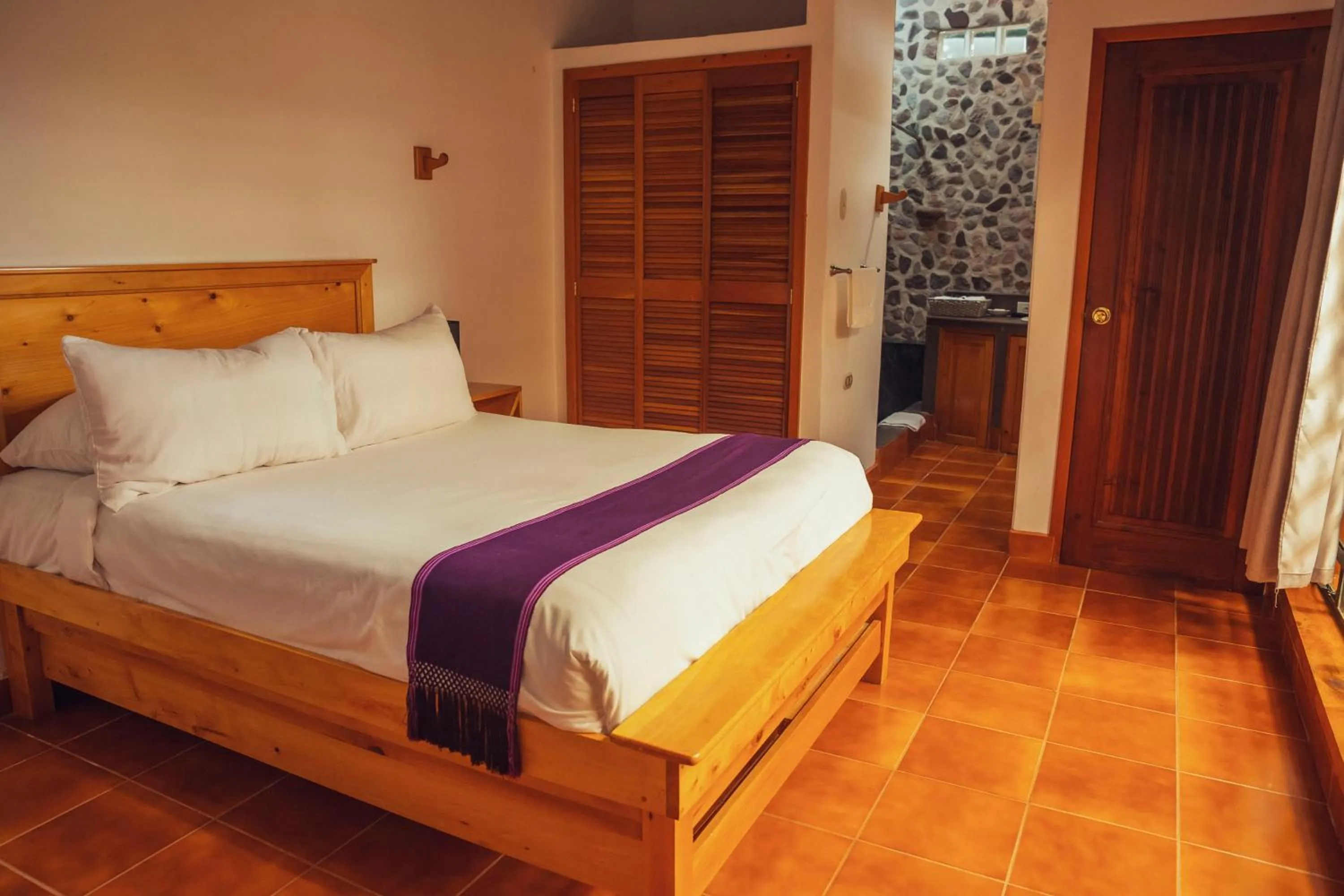 Bed in El Dragon Hotel