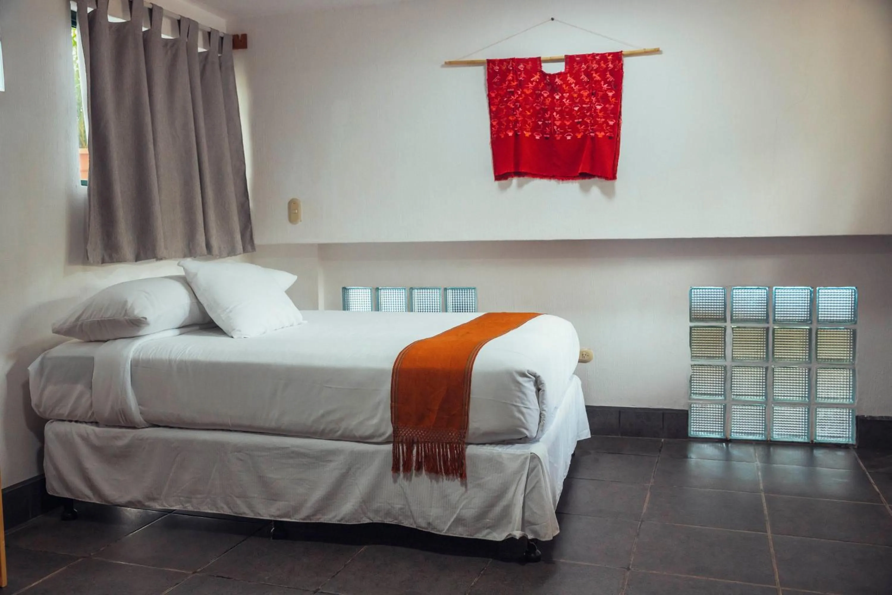 Bed in El Dragon Hotel