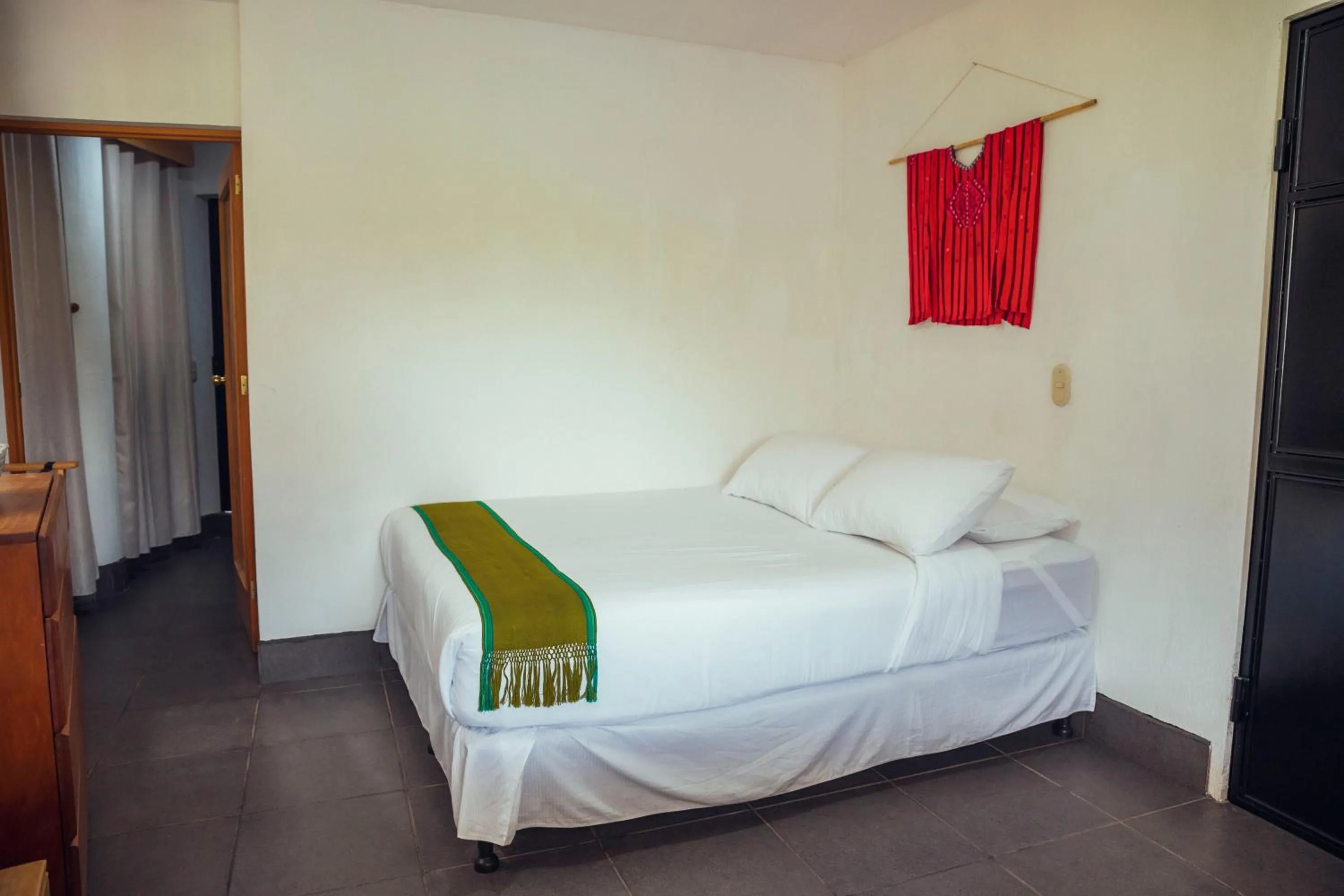 Bed in El Dragon Hotel