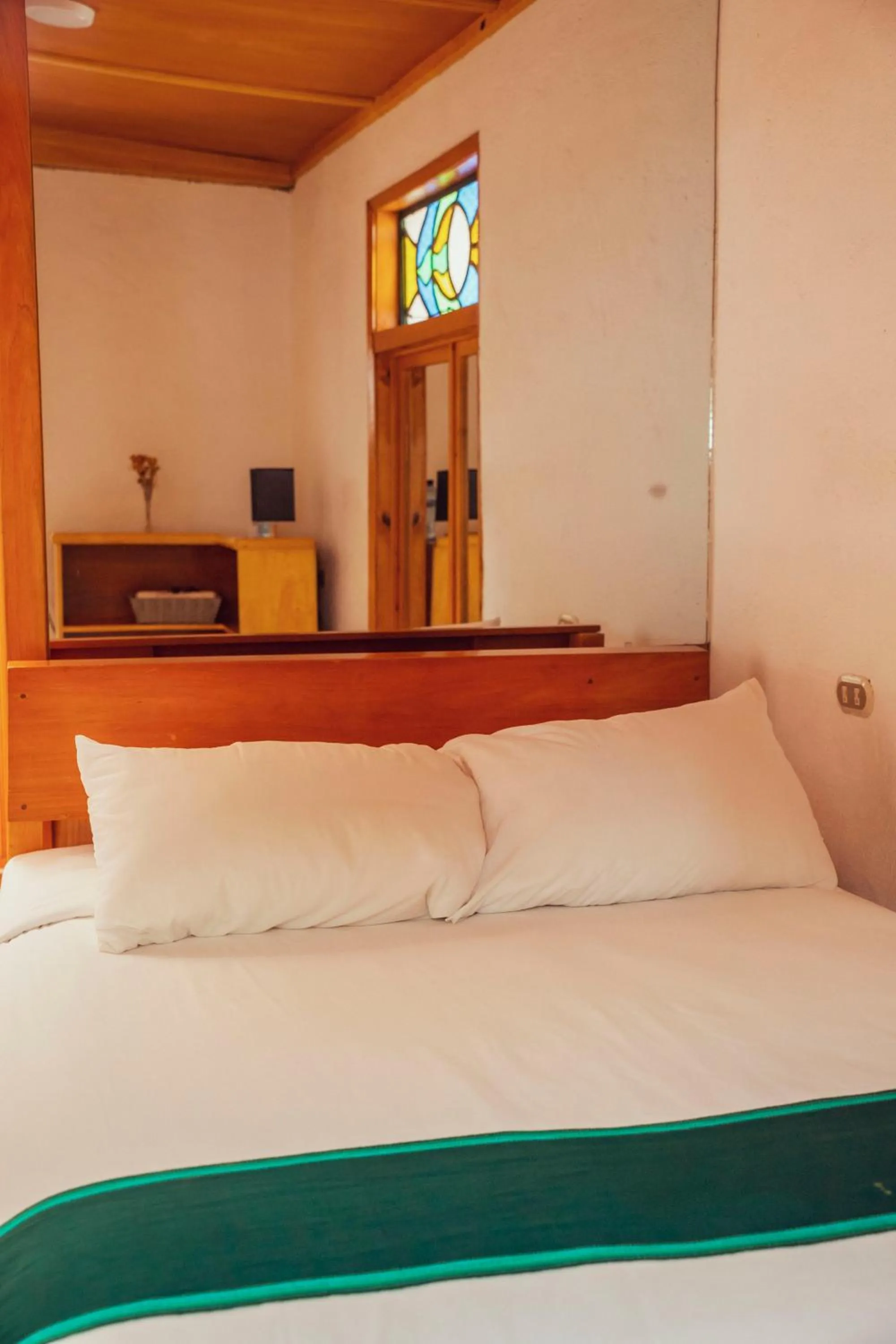 Bed in El Dragon Hotel