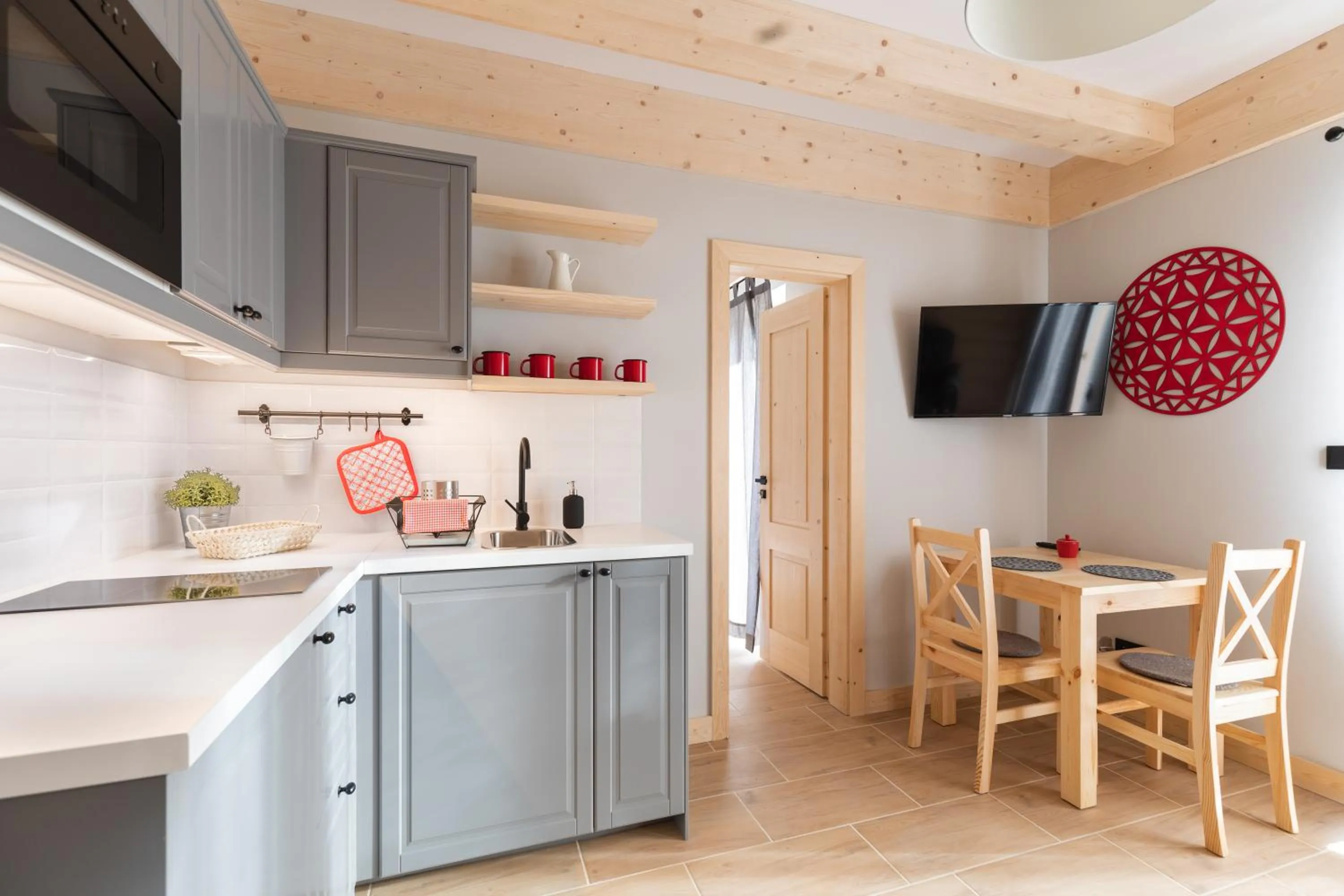 Kitchen or kitchenette in Apartamenty Zobacz Giewont Zakopane