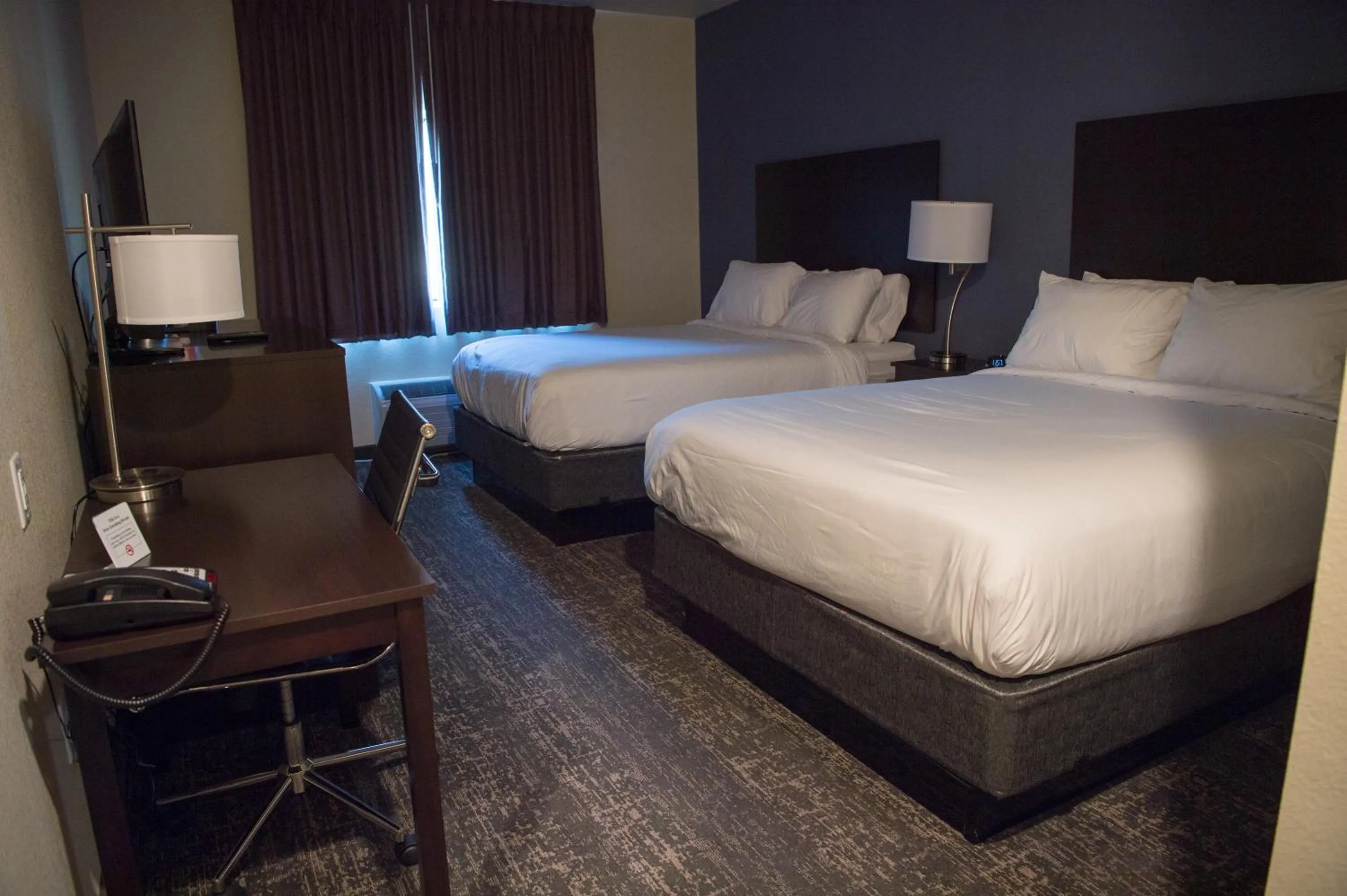 Bed in Cobblestone Inn & Suites - Forest City