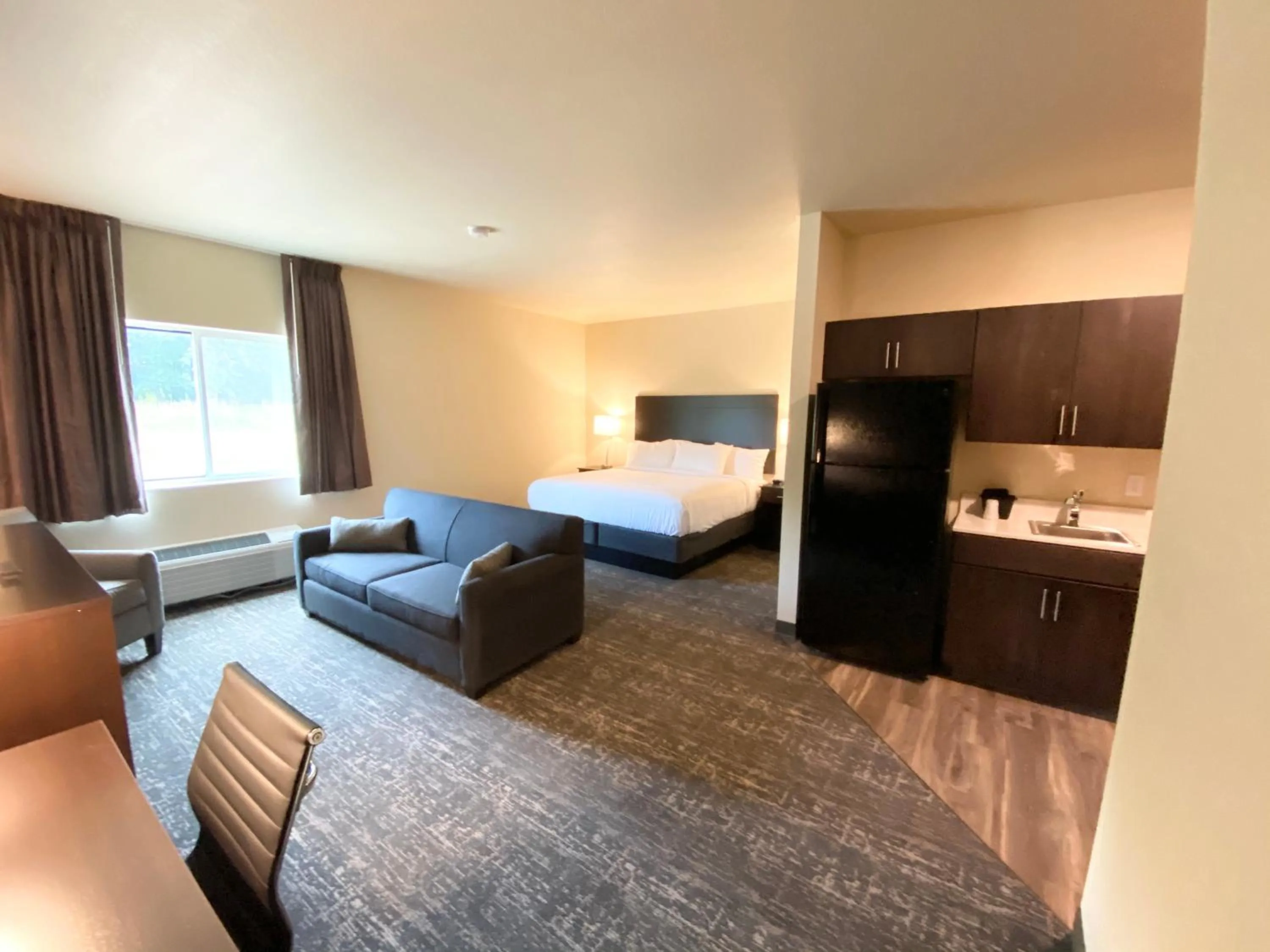 Bed in Cobblestone Inn & Suites - Forest City