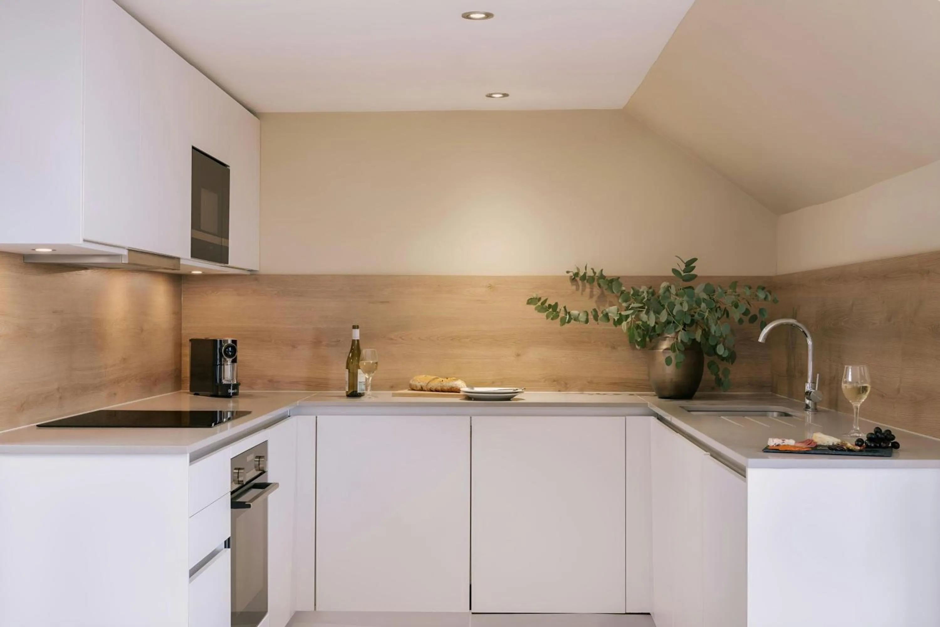 Kitchen or kitchenette in Sonder by Marriott Bonvoy Royal Garden Apartments New Town