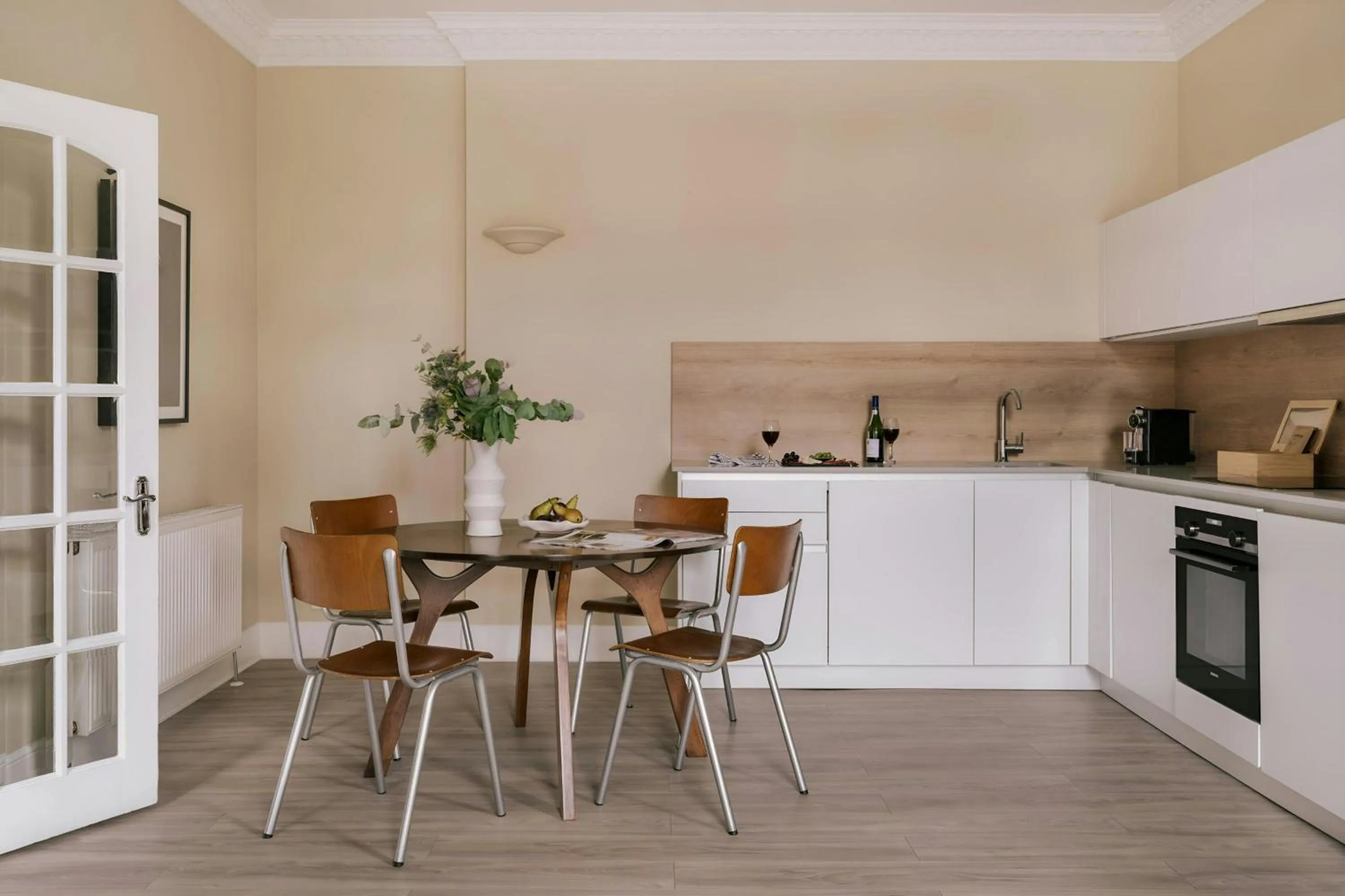 Kitchen or kitchenette in Sonder by Marriott Bonvoy Royal Garden Apartments New Town