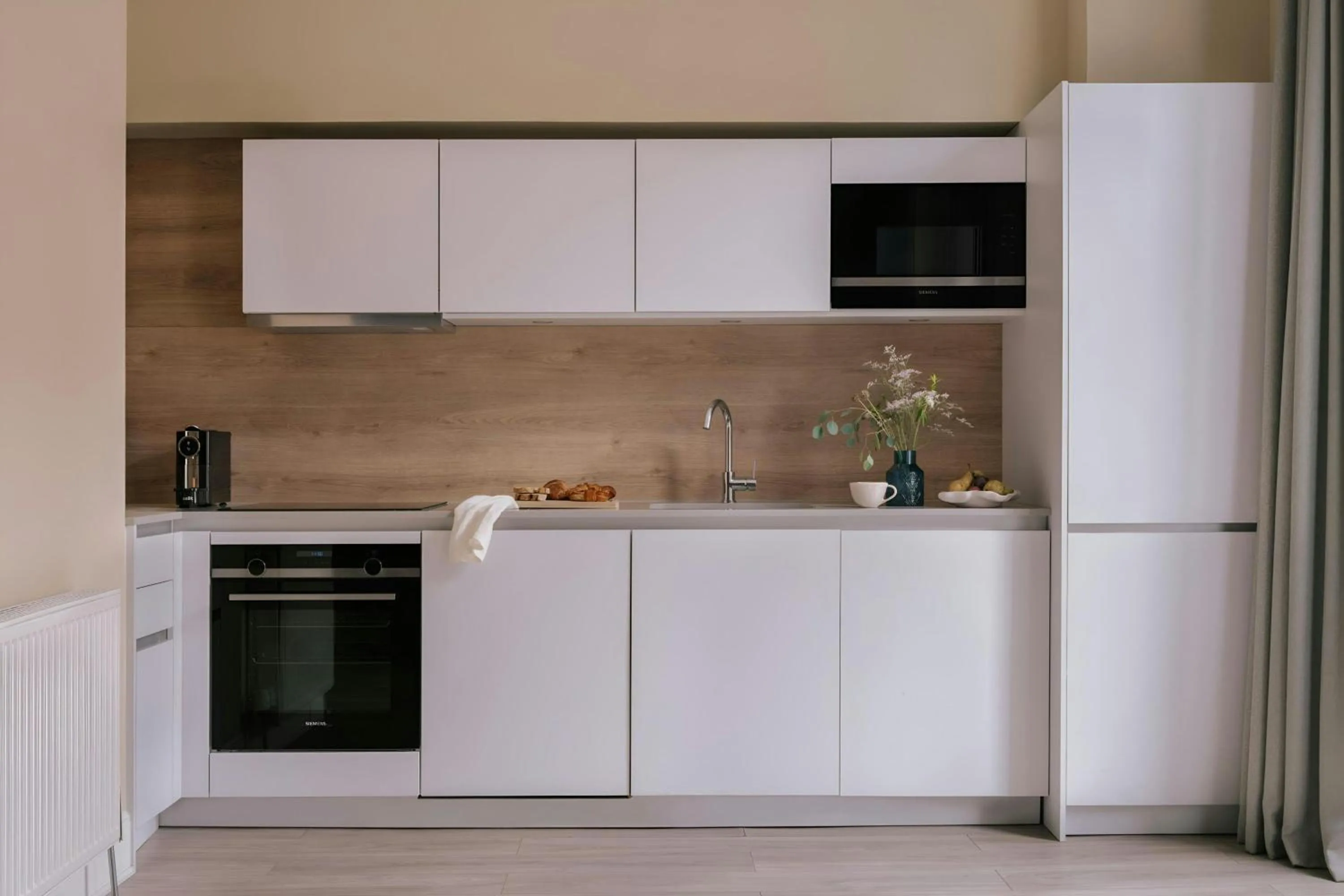 Kitchen or kitchenette in Sonder by Marriott Bonvoy Royal Garden Apartments New Town