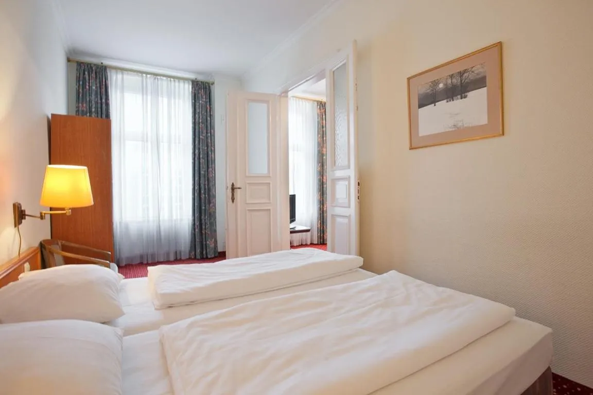 Bedroom, Bed in acom Hotel Berlin Kurfürstendamm